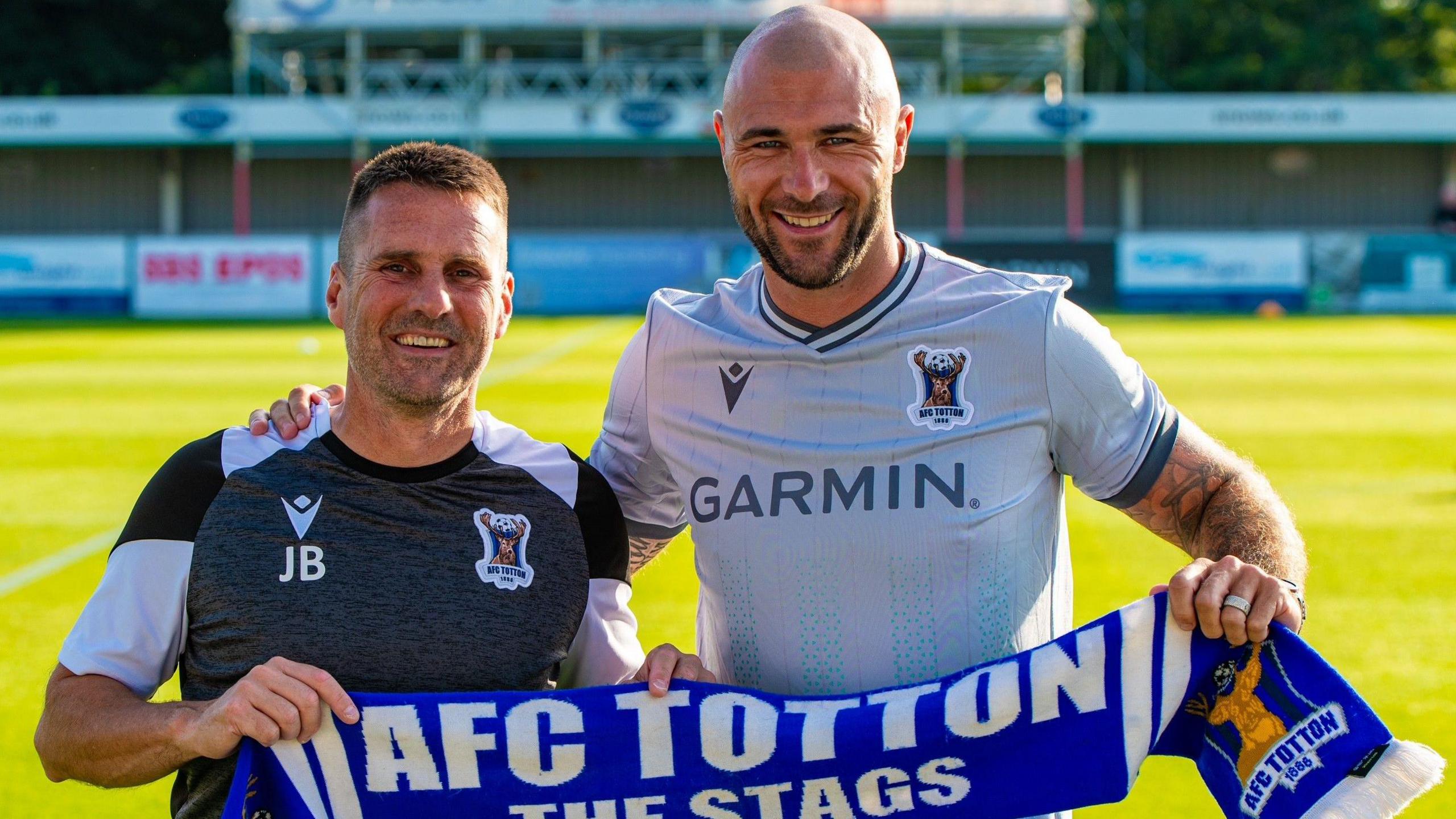 AFC Totton's new signing Charlie Austin alongside manager Jimmy Ball