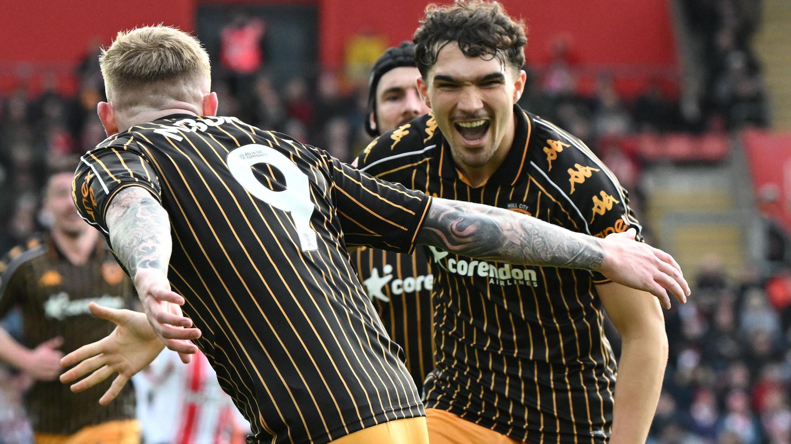 Kyle Joseph celebrates his goal against Southampton as his team mate Oli McBurnie goes to slap his hand.