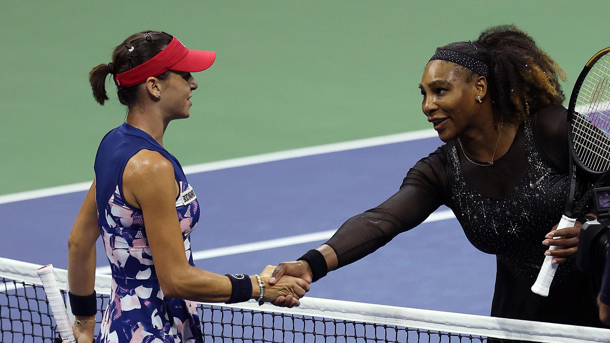 Ajla Tomljanovic shakes hands with Serena Williams after beating her at the US Open in 2022
