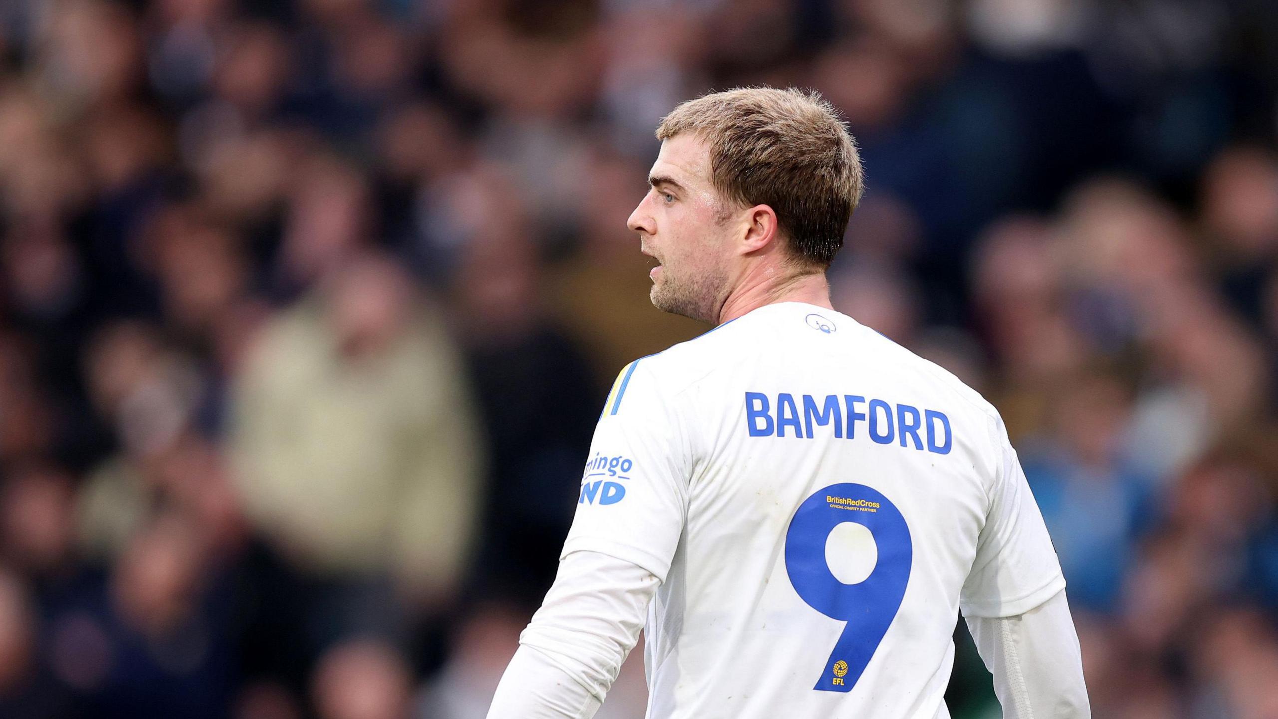 Image showing back of Patrick Bamford shirt with number nine on it while he looks on sideways
