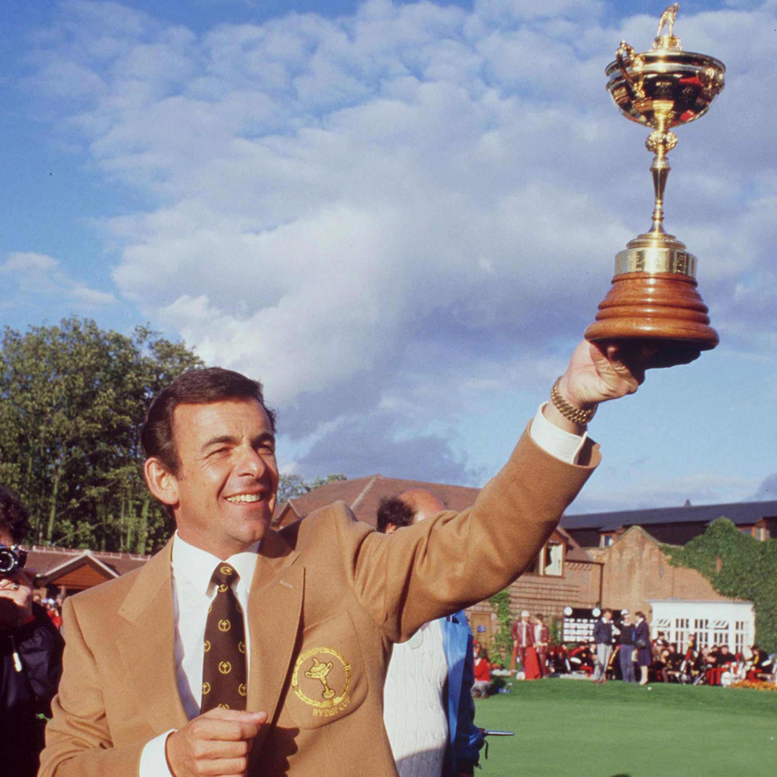 Europe captain Tony Jacklin raises the Ryder Cup after winning for the first time at The Belfry in 1985