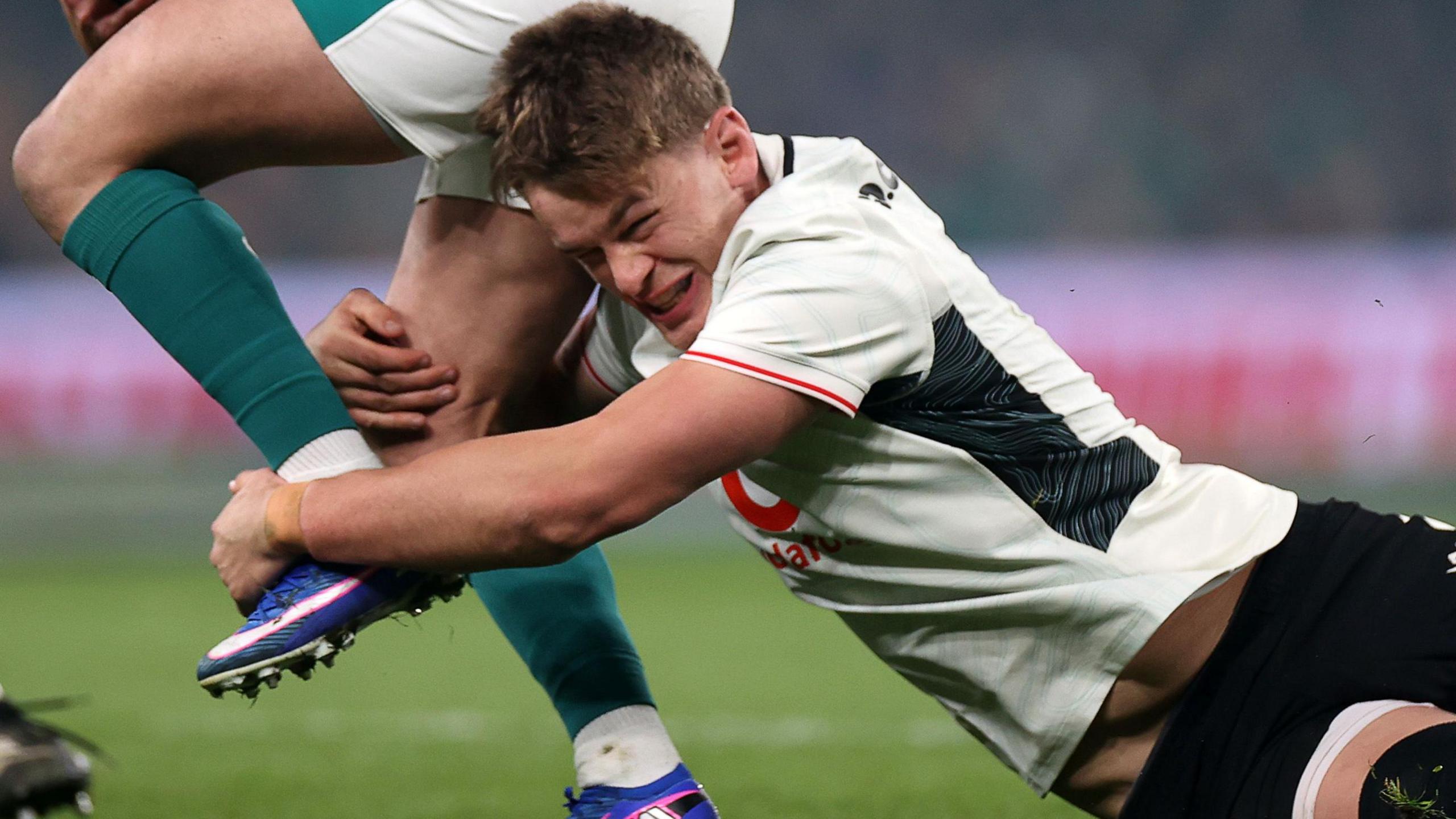 Alex Mann makes a tackle for Wales against Ireland