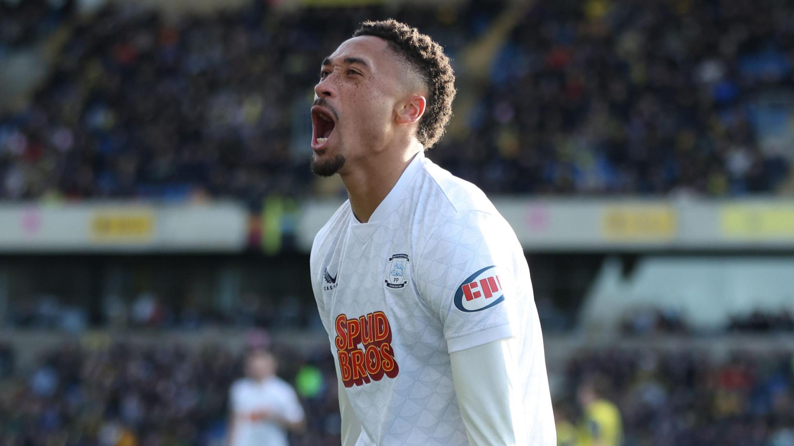 Preston North End striker Daniel Jebbison shouts in celebration after scoring at Oxford United
