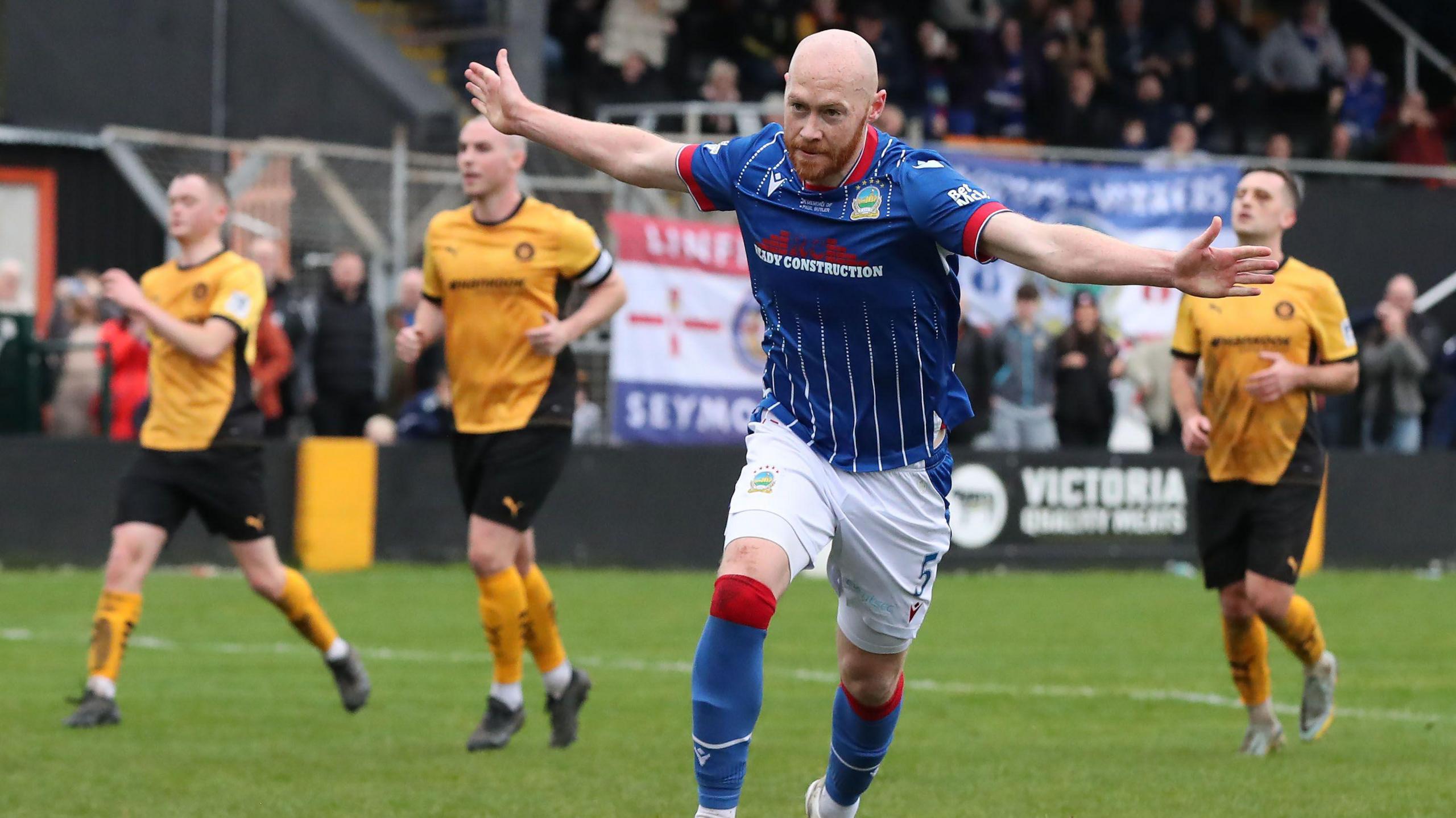 Chris Johns celebrates scoring a penalty