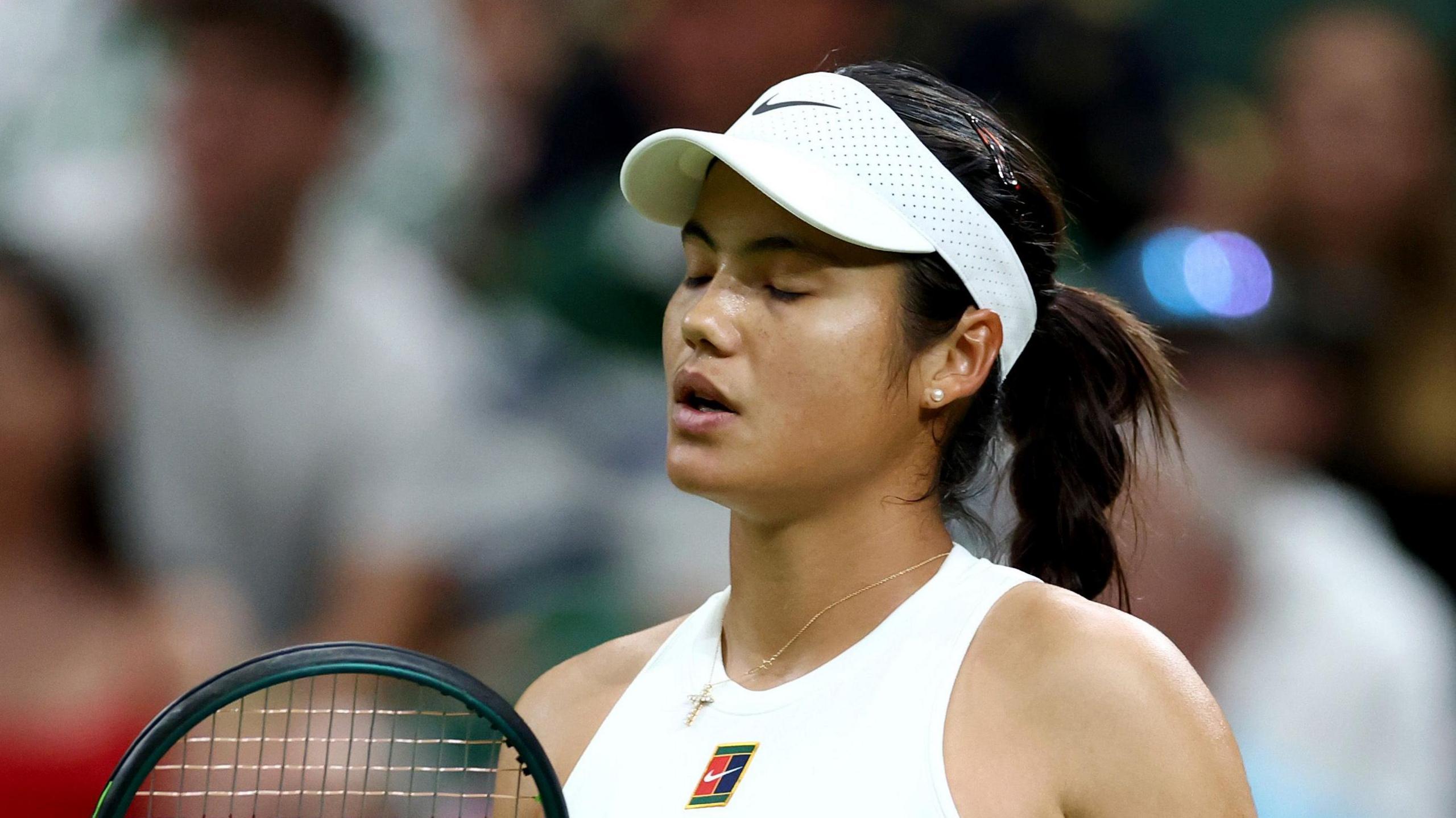 Emma Raducanu looks dismayed against Aryna Sabalenka