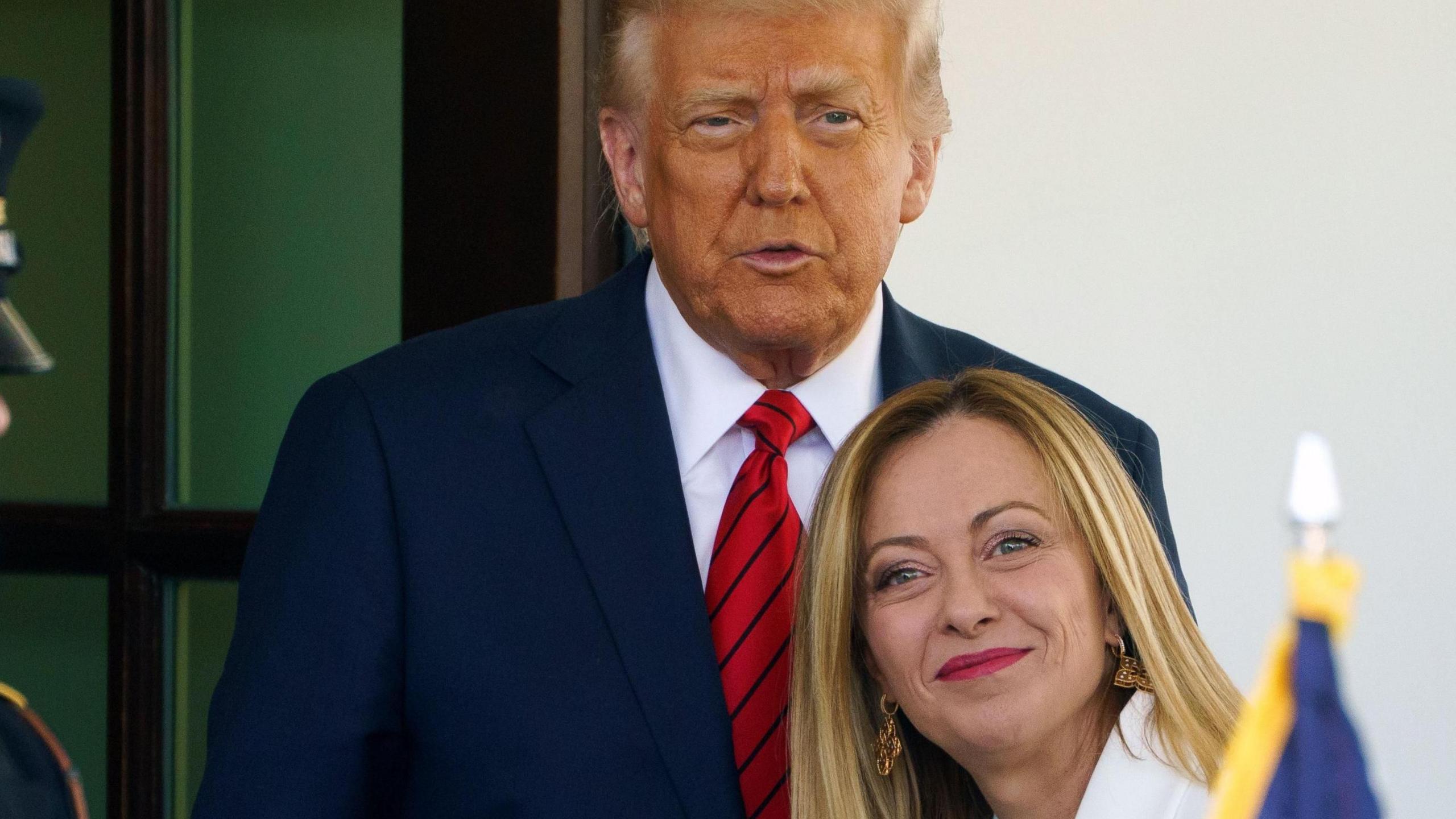 US President Donald Trump (L) greets Italian Prime Minister Giorgia Meloni at the White House in April 2025.
