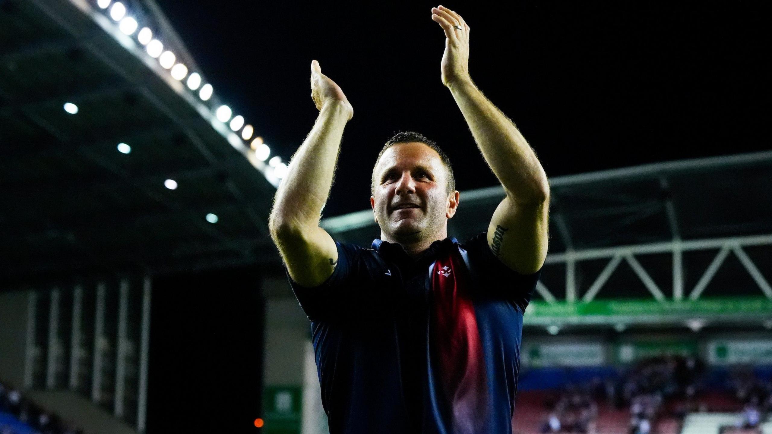 Willie Peters smiles as he claps the Hull KR fans after the club beat Wigan away to close in on the League Leaders' Shield in Super League