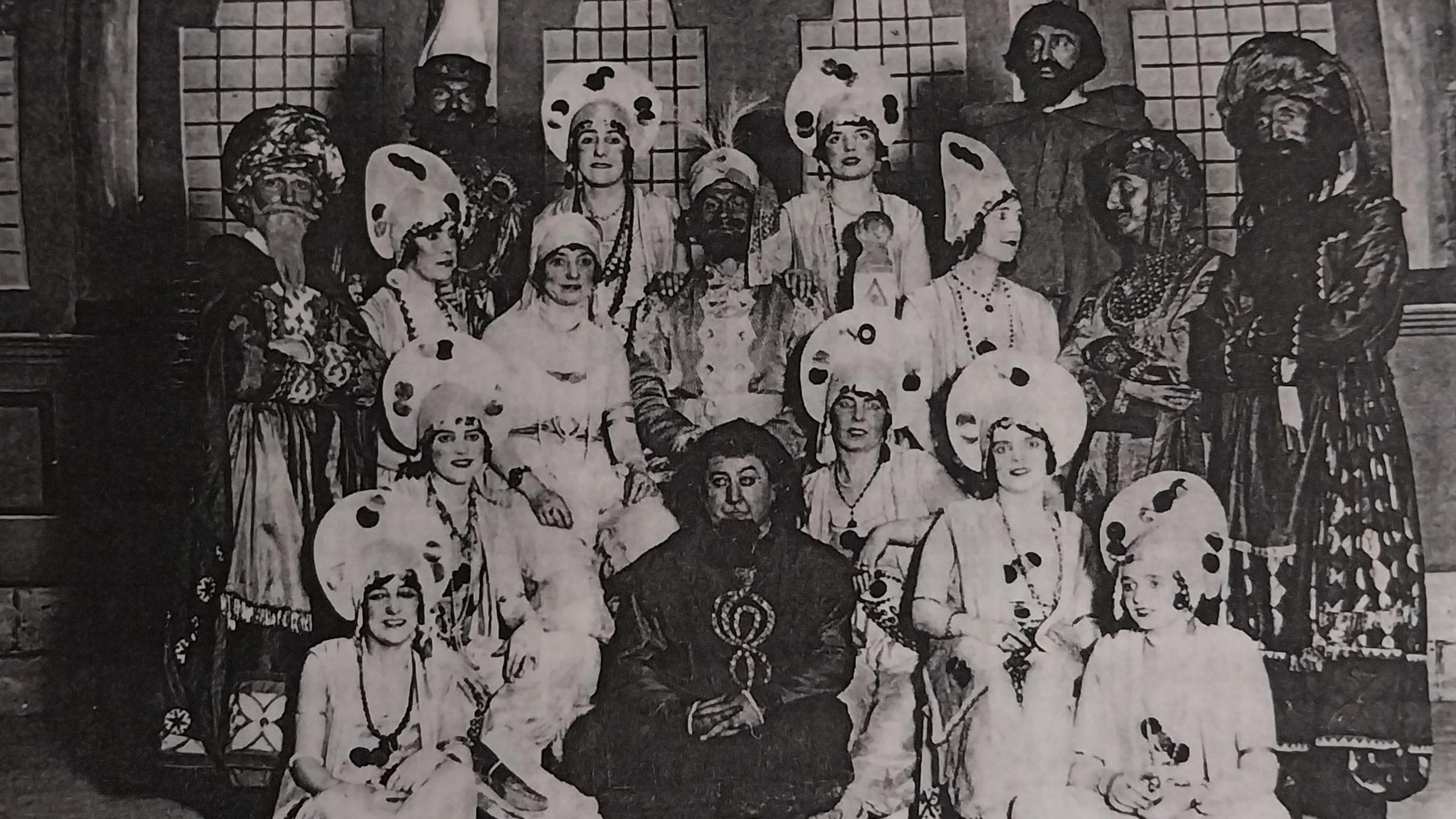 A black and white photo of the PODS cast of Rose of Persia dressed in costume in 1928