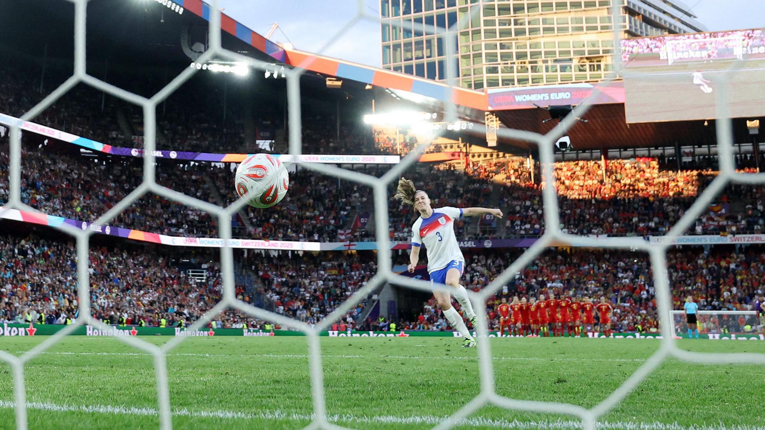 England's Niamh Charles scores a penalty during the shoot-out 
