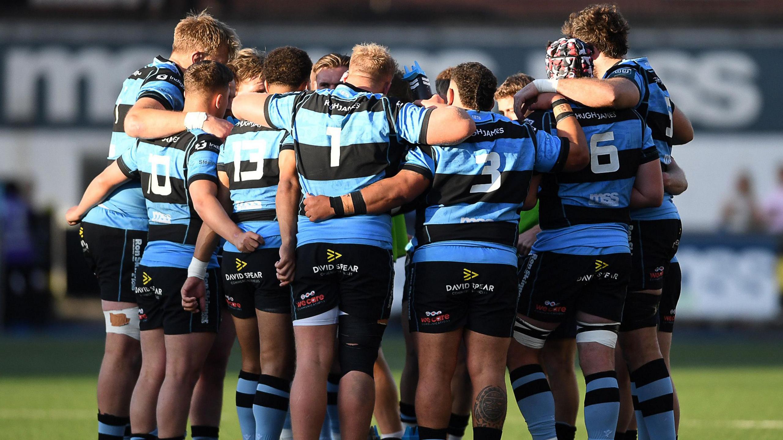 Cardiff players in a huddle