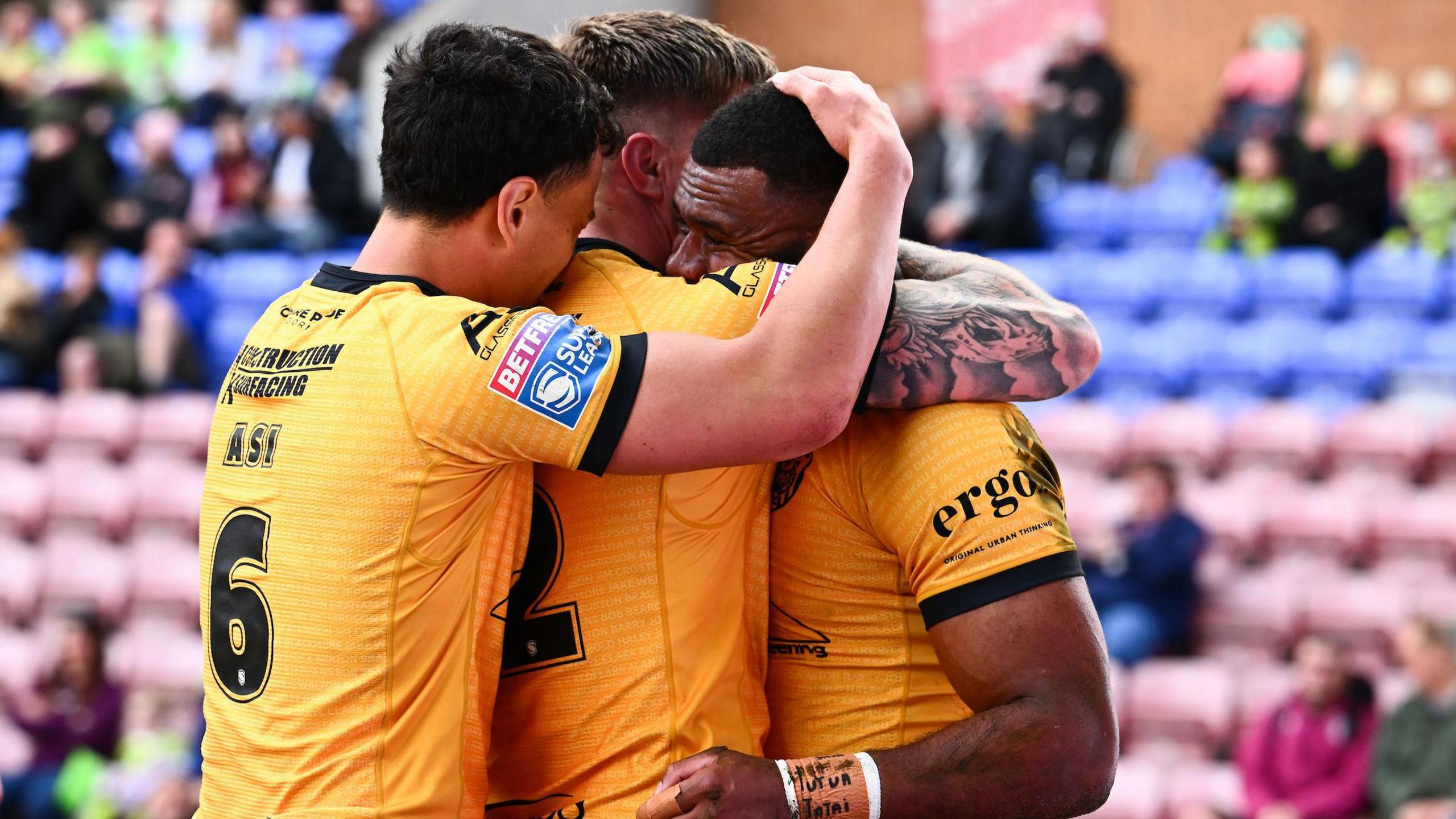 Castleford Tigers celebrate against Wigan Warriors