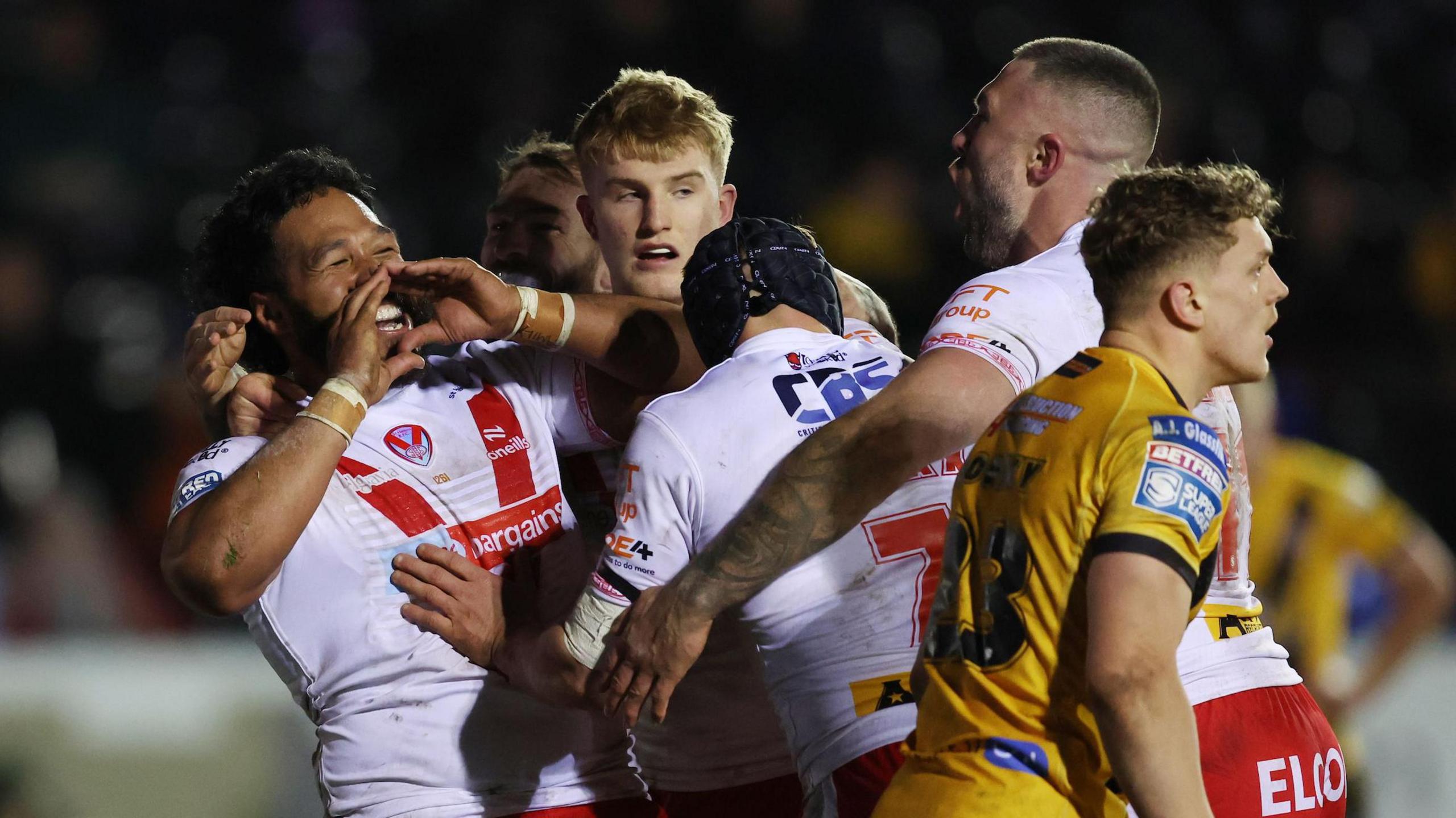 St Helens players congratulate Agnatius Passi (left) after he scores a try against Castleford