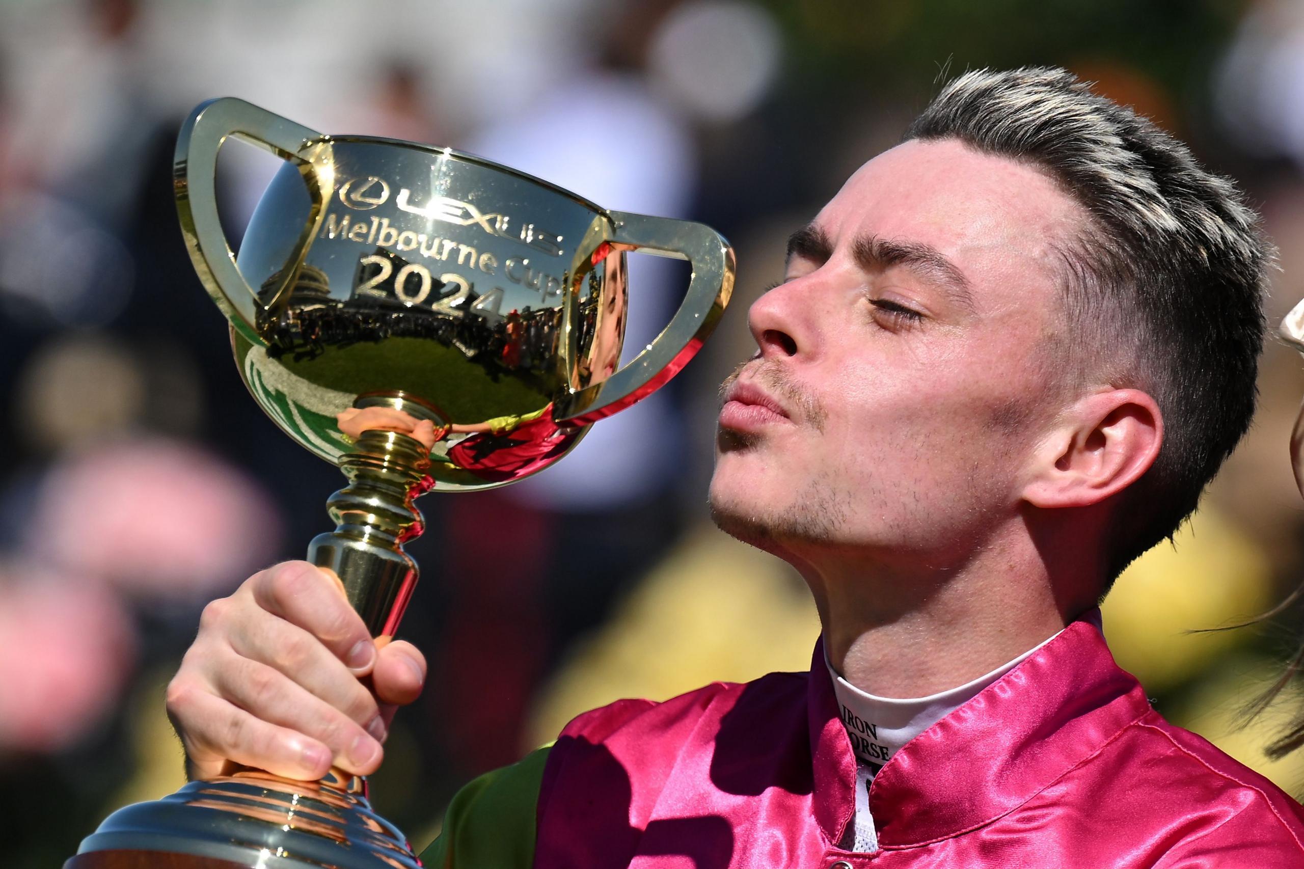 Jockey Robbie Dolan with the Melbourne Cup