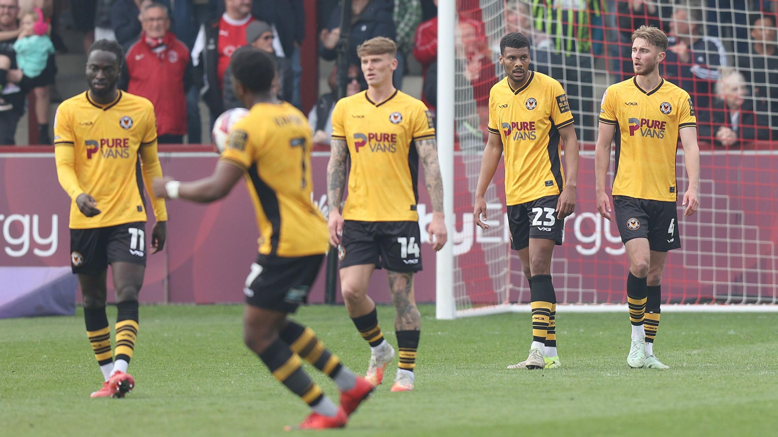 Newport County players look dejected after conceding a goal at Fleetwood Town