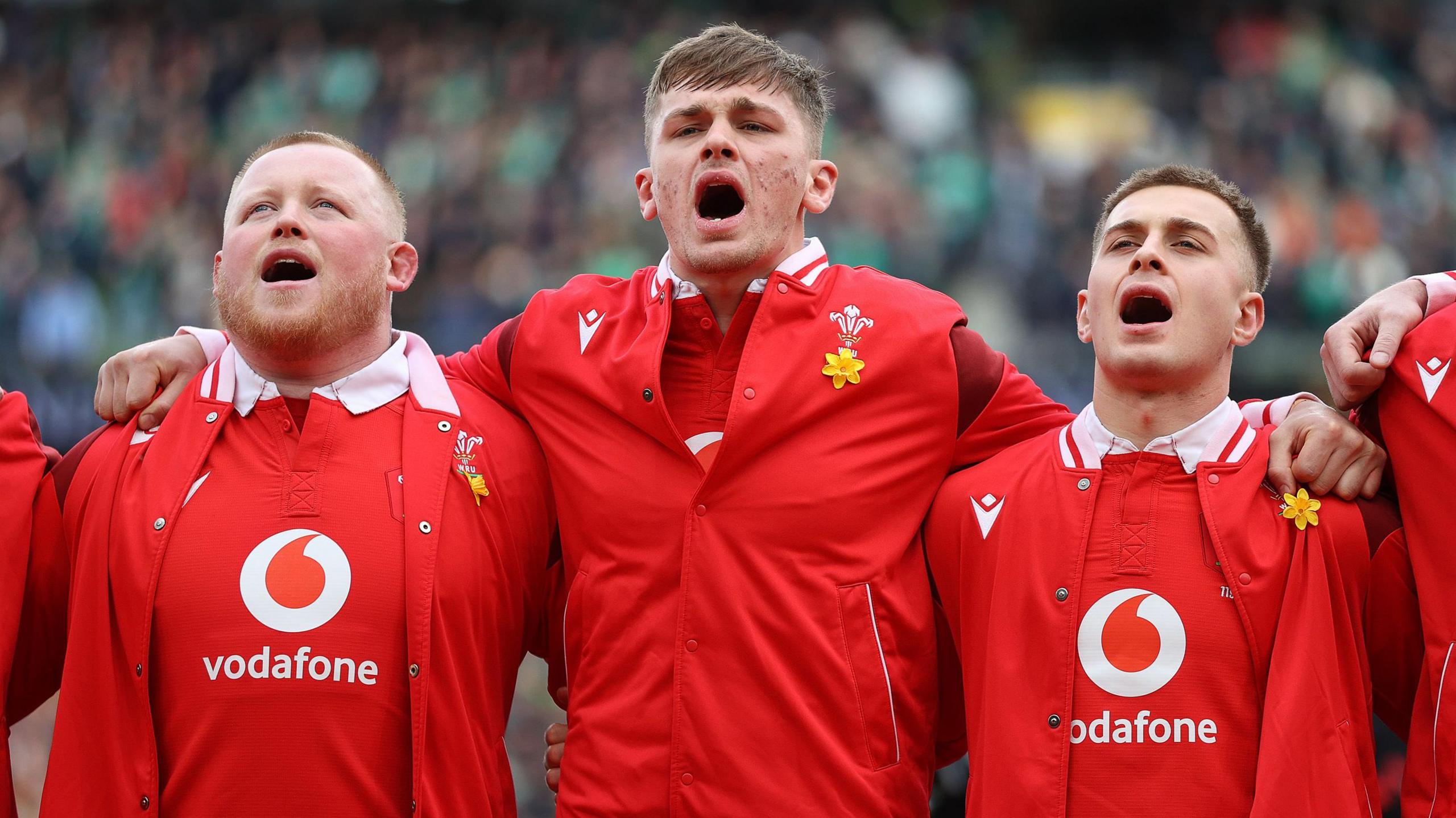 Keiron Assiratti, Alex Mann and Cam Winnett singing the Welsh national anthem