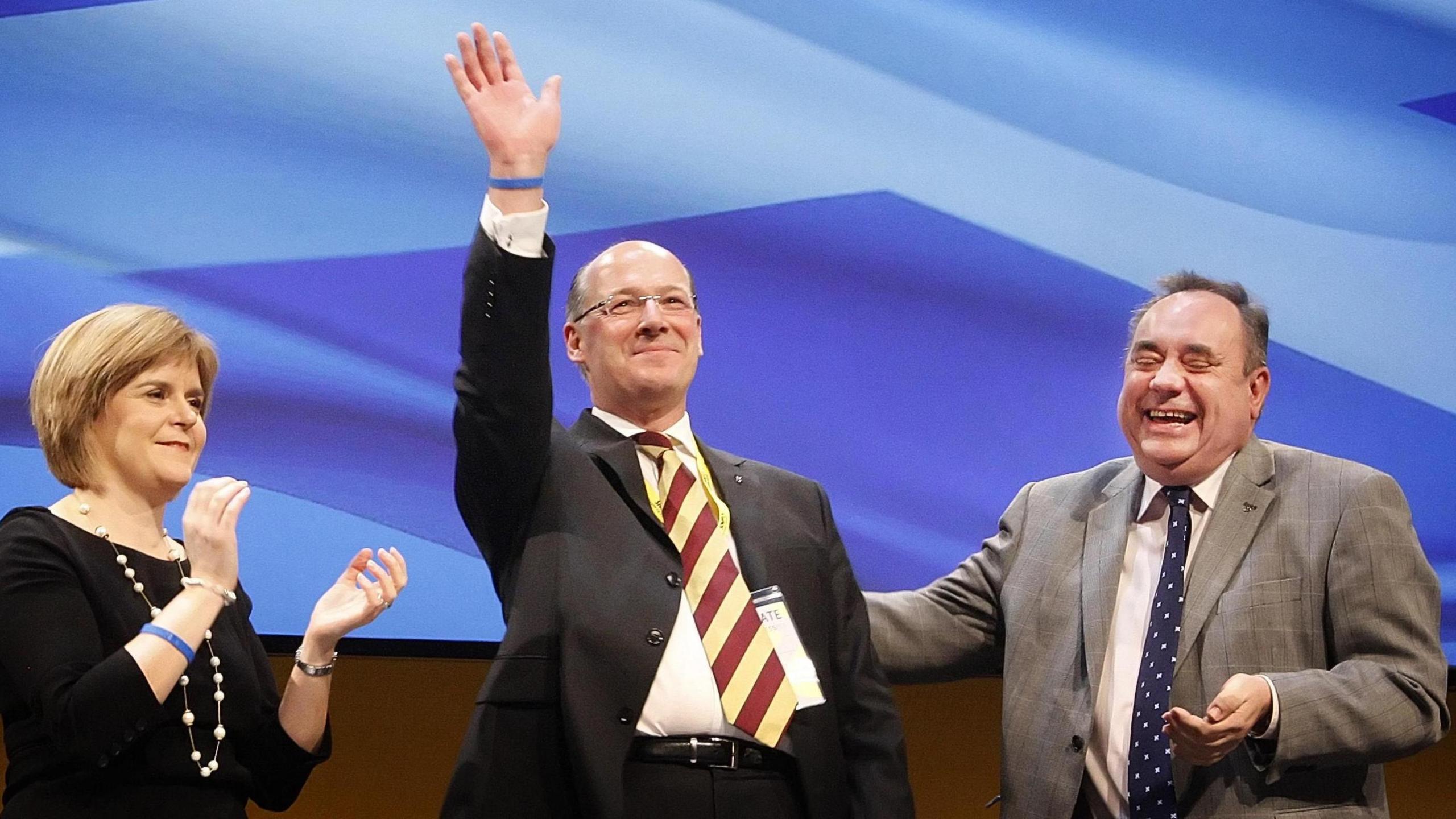 Deputy First Minister Nicola Sturgeon, MSP John Swinney and First Minister Alex Salmond during the last day of the 77th Scottish National Party annual conference at the Eden Court Theatre in Inverness.
