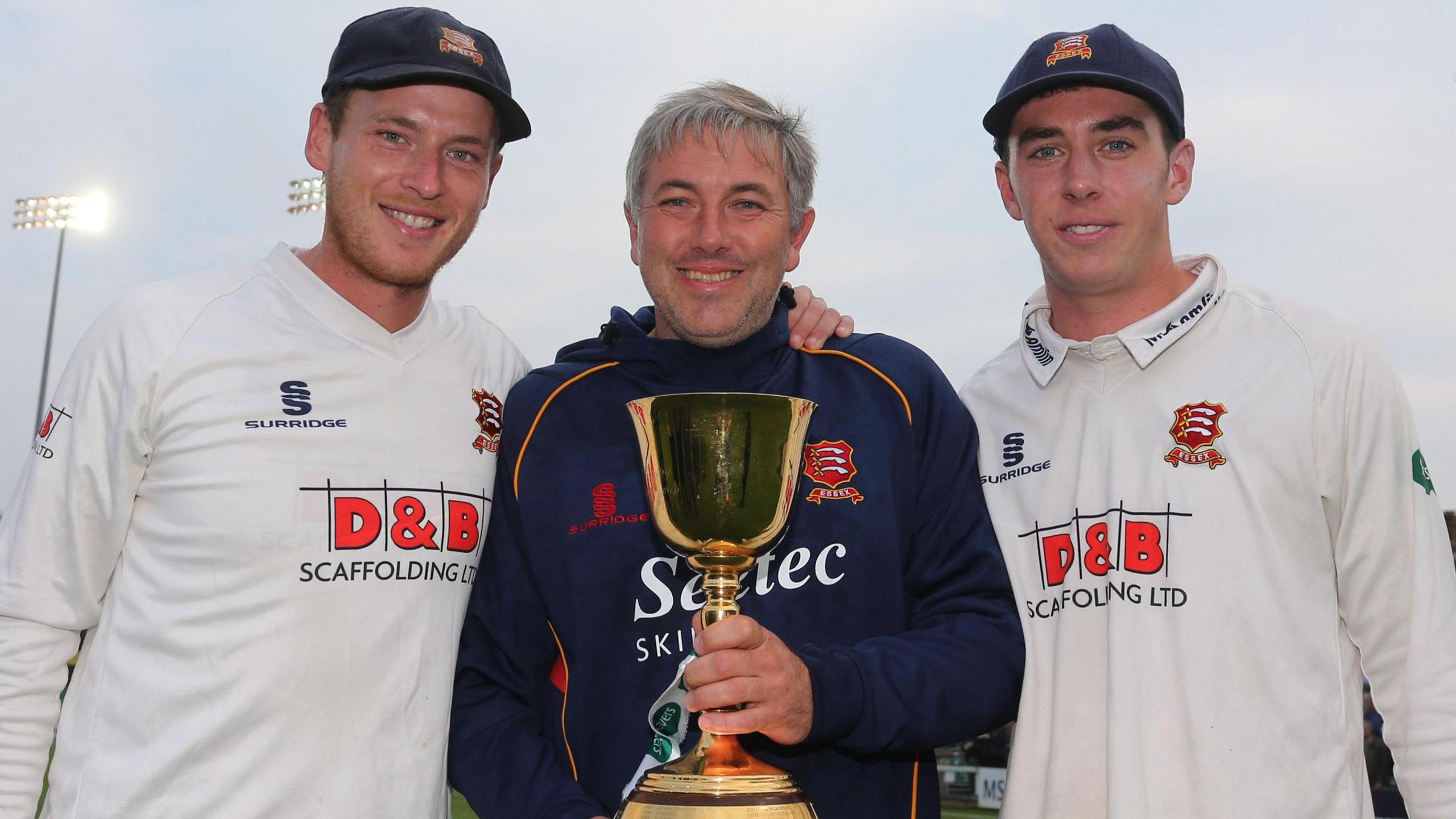 Tom Westley, Chris Silverwood and Dan Lawrence with the County Championship trophy at Chelmsford in 2017.