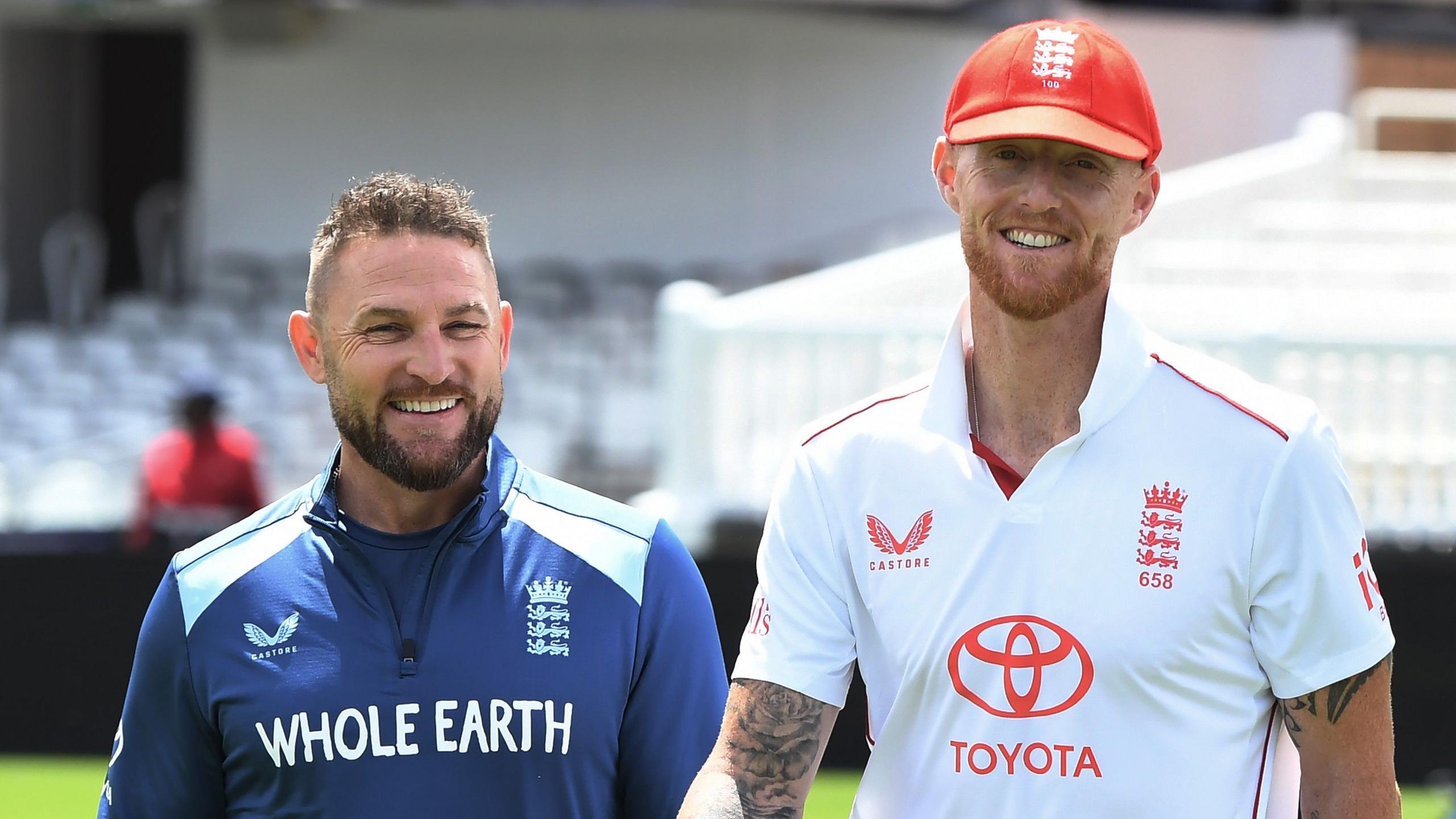 Brendon McCullum and Ben Stokes smile at a pre-first Test photo shoot