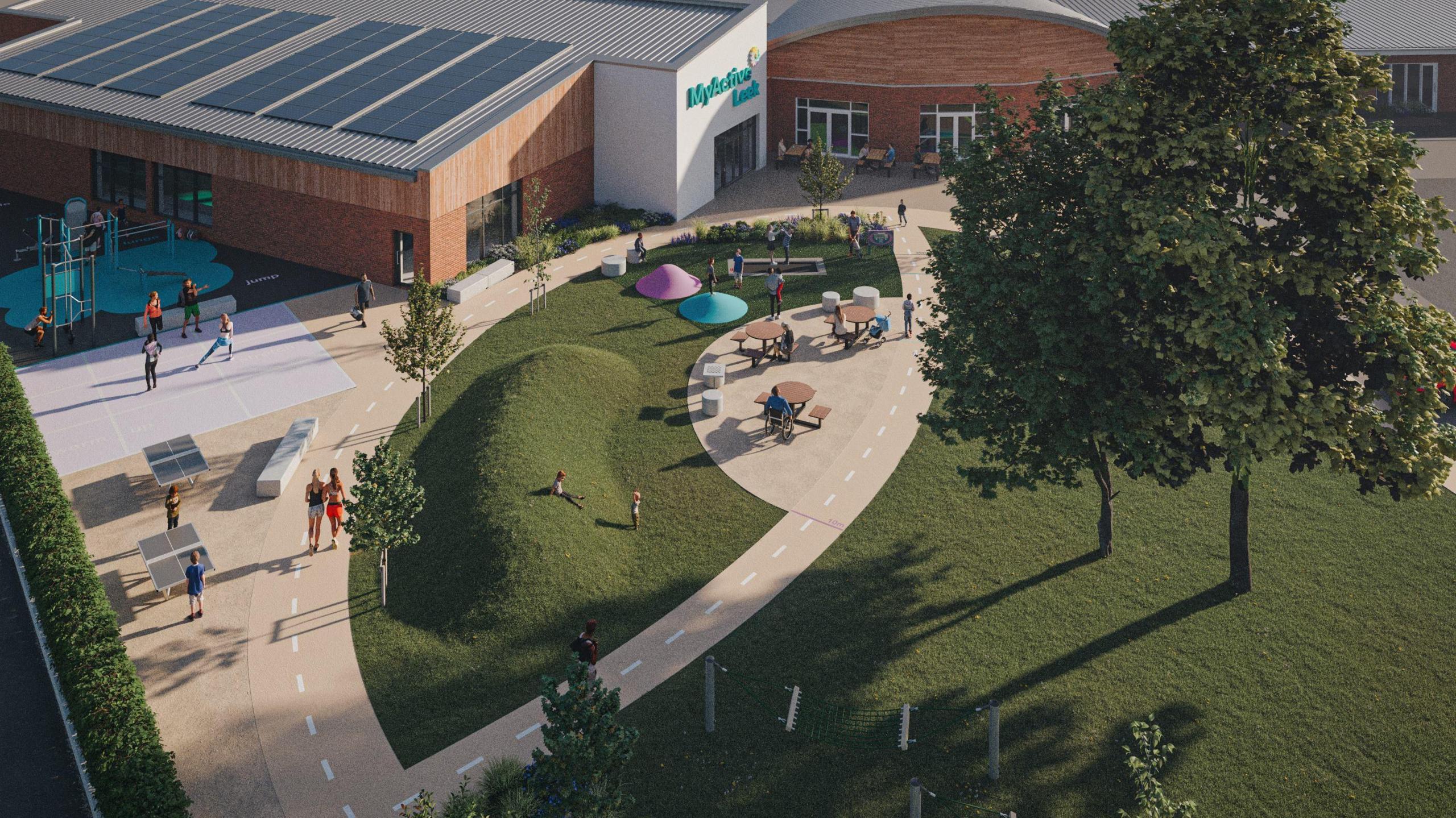 An artist's impression of a new leisure centre from an aerial perspective. There is a landscaped footpath leading to a large white-painted entrance to the building. The main section of the building is clad with wood in its top half and there are solar panels on the roof. There are people sitting at picnic benches and walking around a garden area in front of the building.