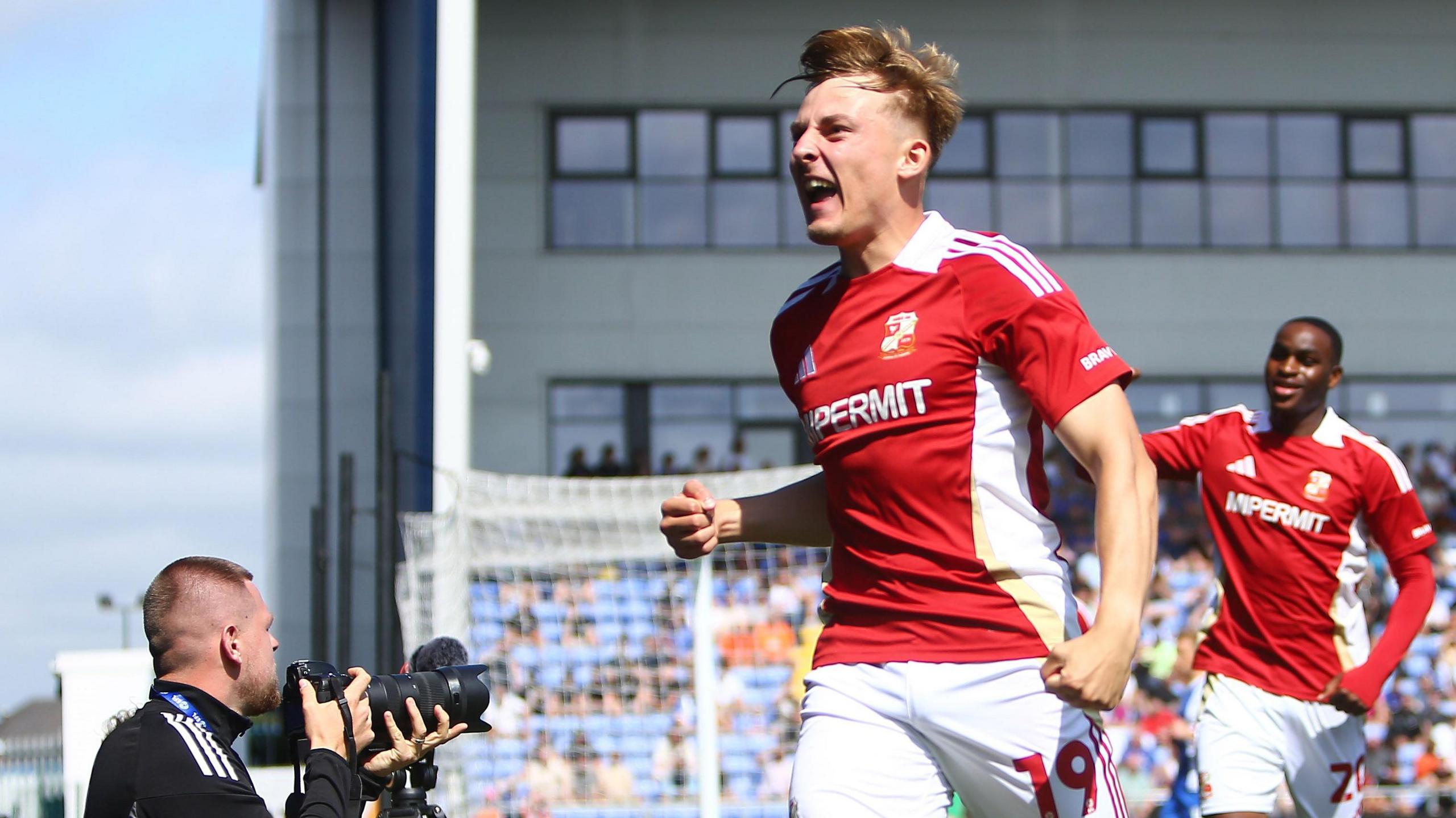 Joe Snowdon celebrates a goal for Swindon Town