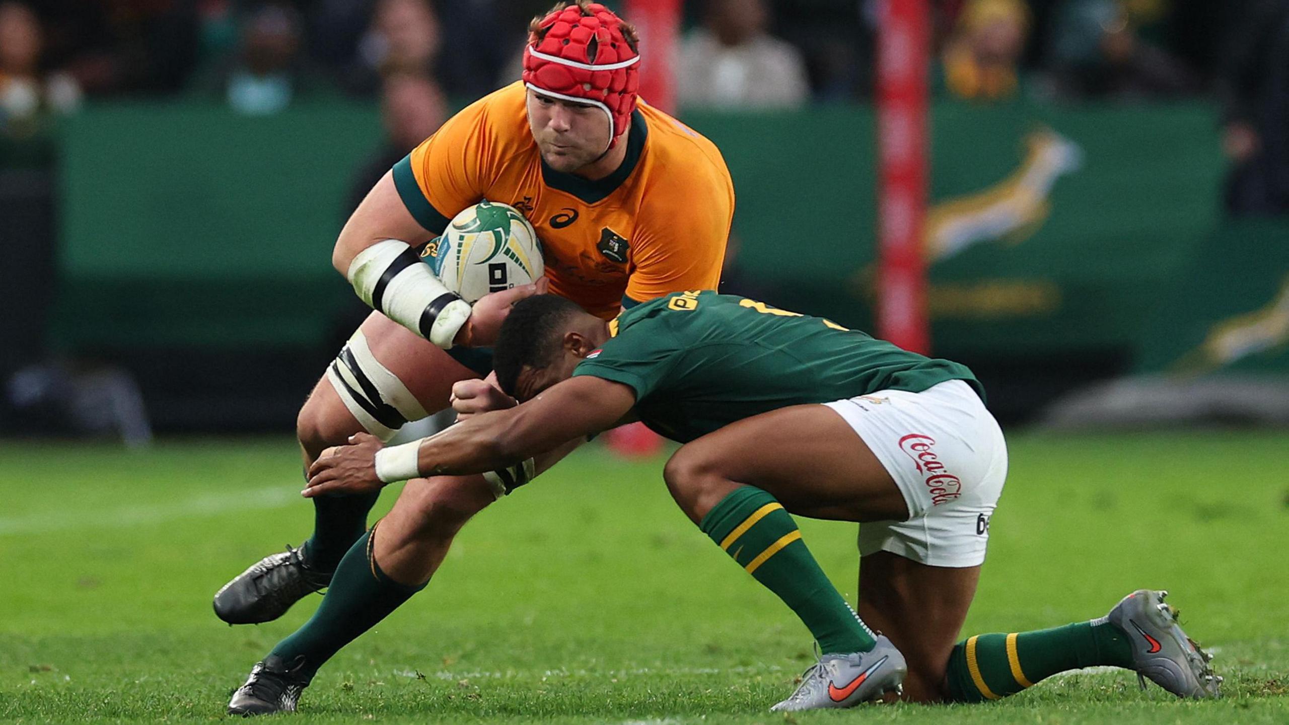 Australia's Harry Wilson is tackled
