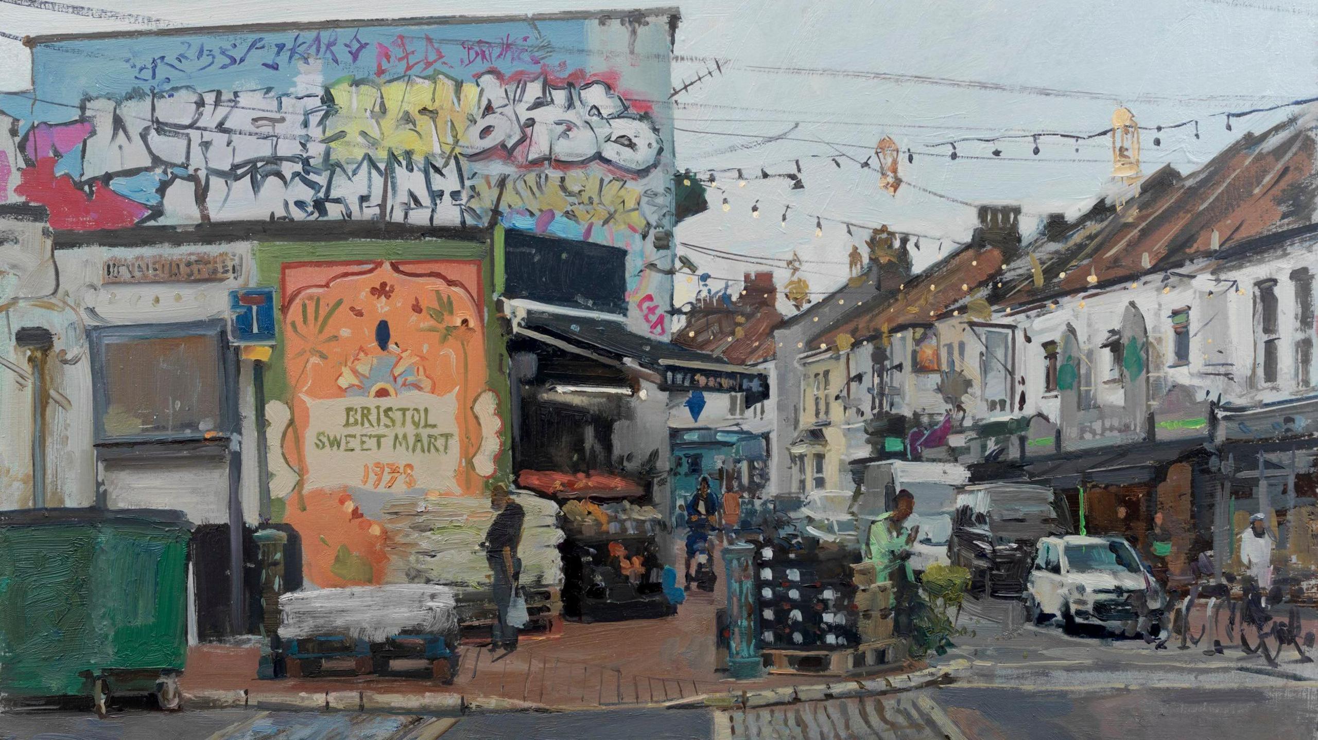 An oil painting of a business in Easton, Bristol. There are fairy lights hanging up over the street and graffiti can be seen on the building. Several people can be seen walking on the street.