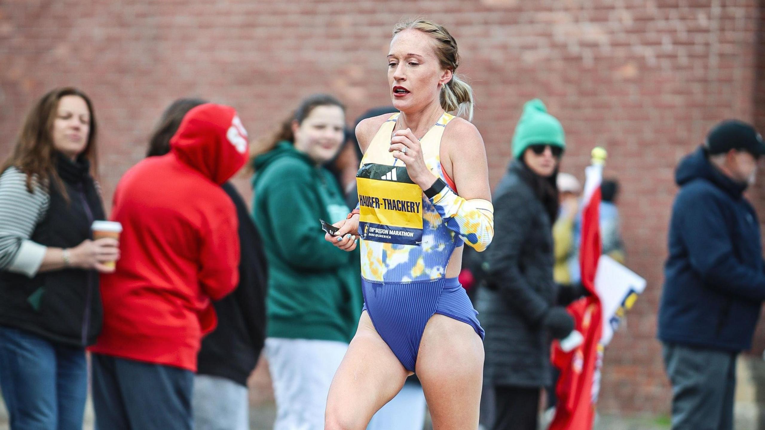 Calli Hauger-Thackery running at the Boston Marathon 