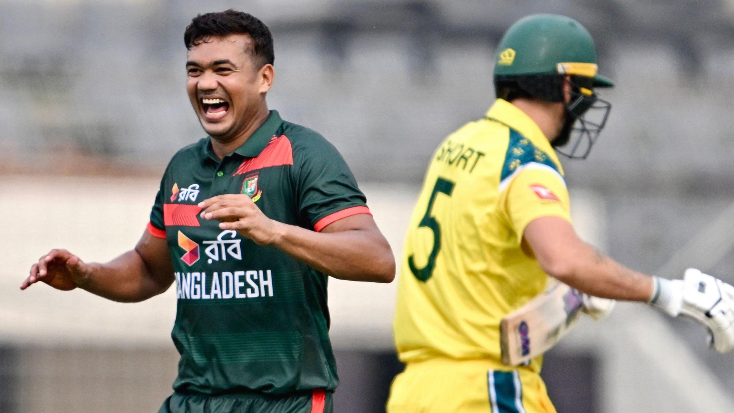 Taskin Ahmed celebrates the wicket of Matt Short