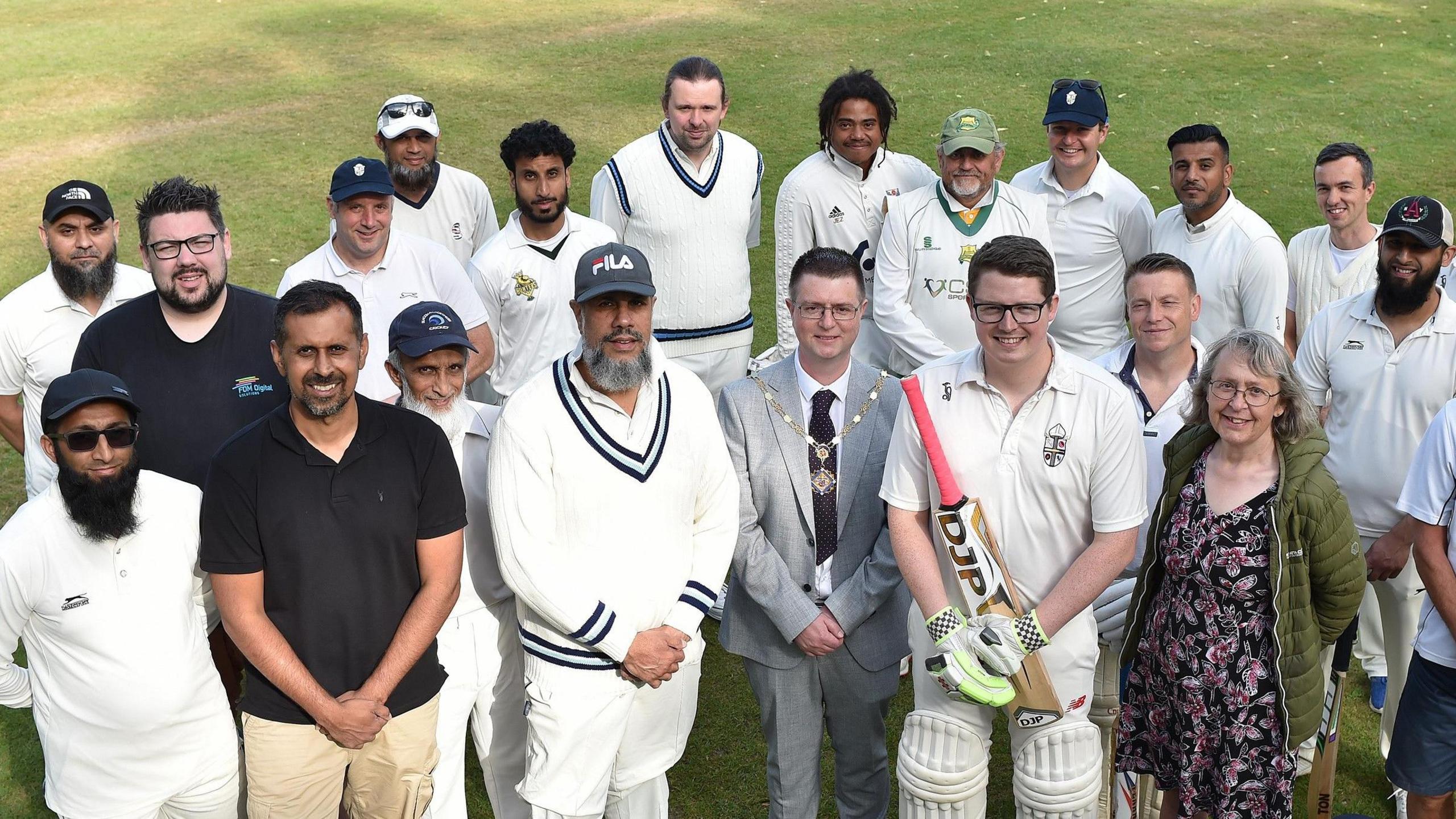 Vicars and imams gather after the match