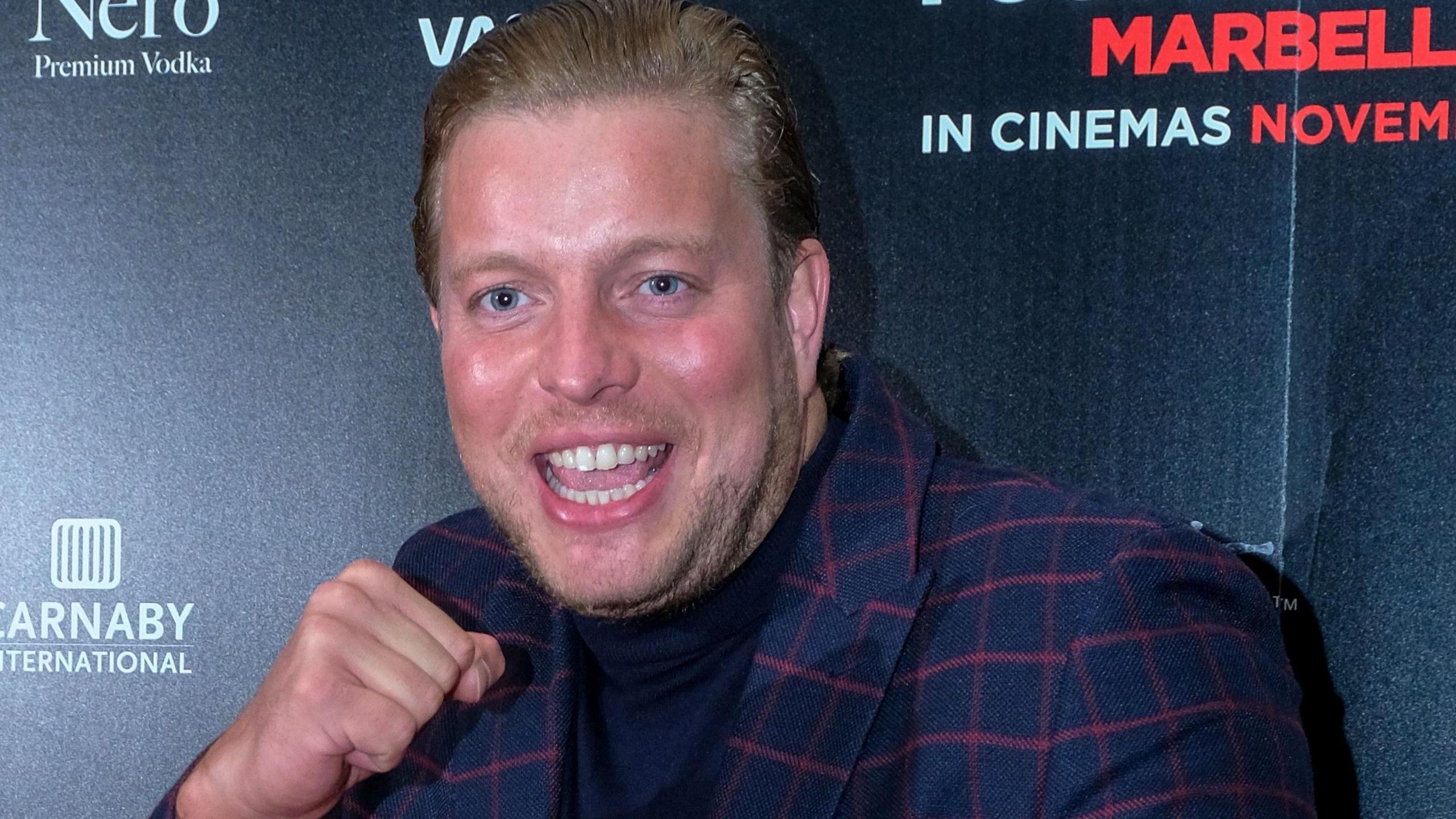 Thomas Skinner smiling and in a boxing pose at the premiere of Rise of the Footsoldier 4 : Marbella in 2019