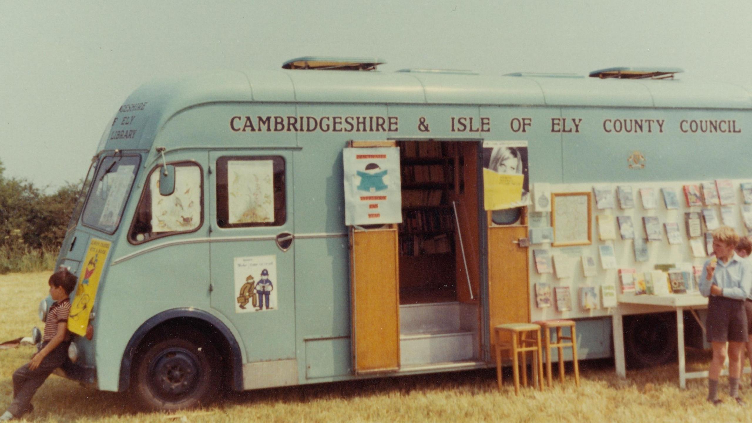 Children outside library van