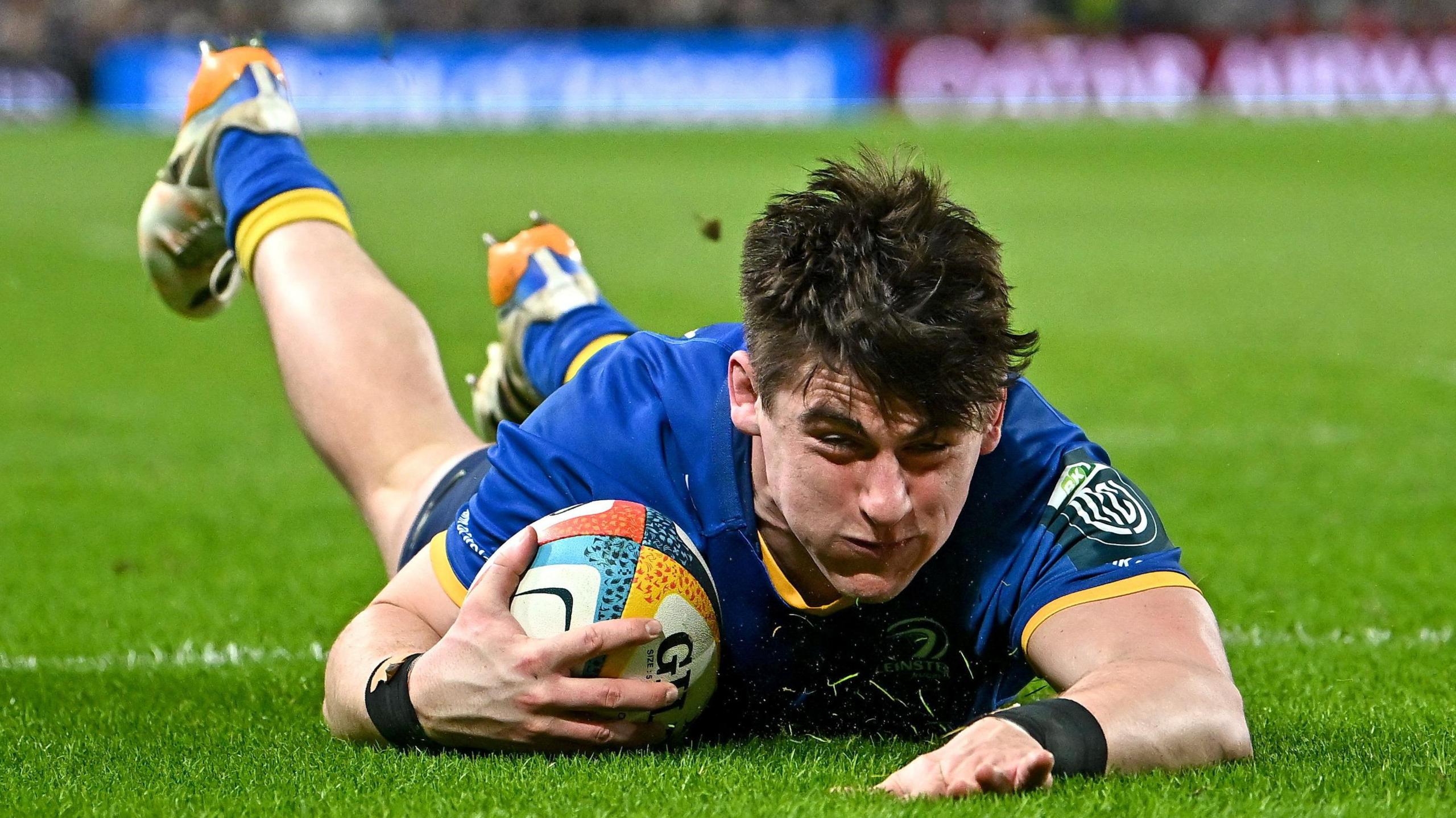 Dan Sheehan slides over for a try