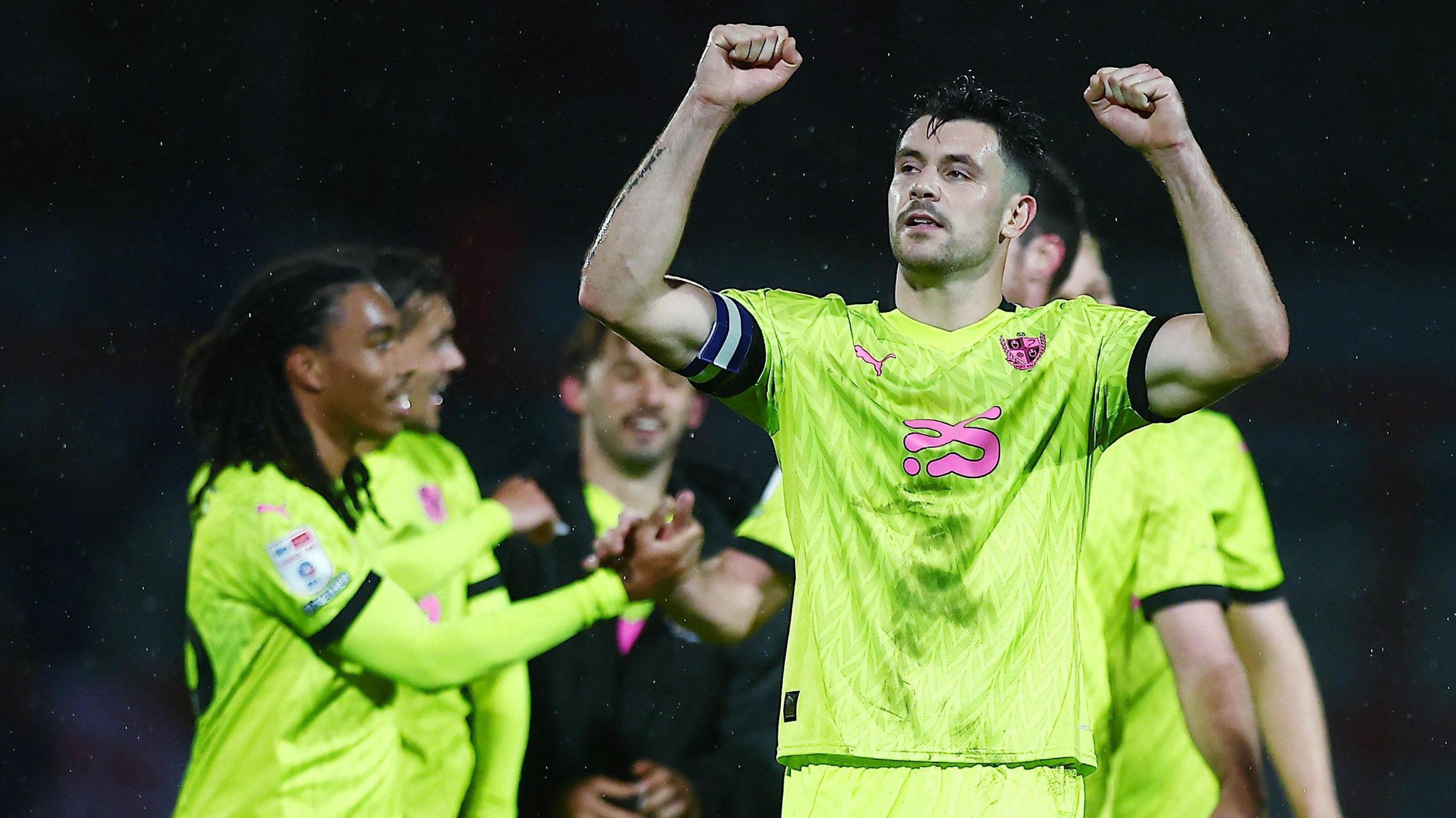 Port Vale's players celebrate their victory against Morecambe