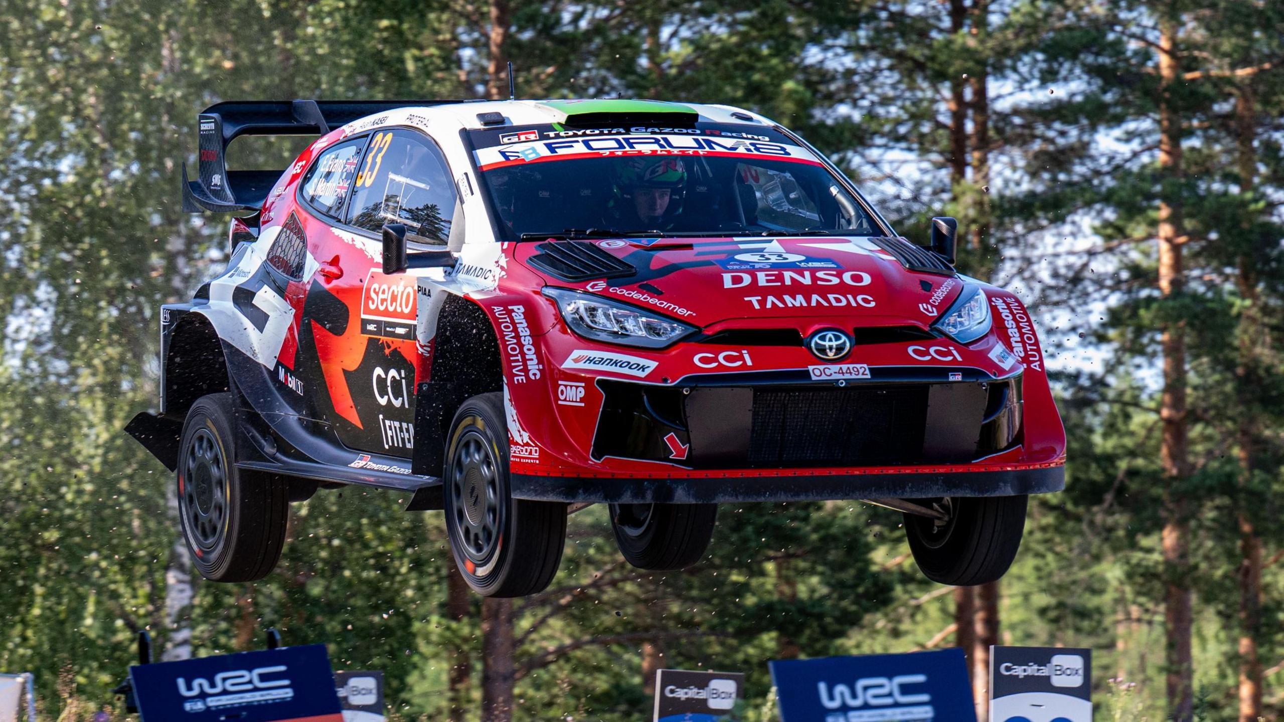 Elfyn Evans' Toyota in mid-air at Rally Finland