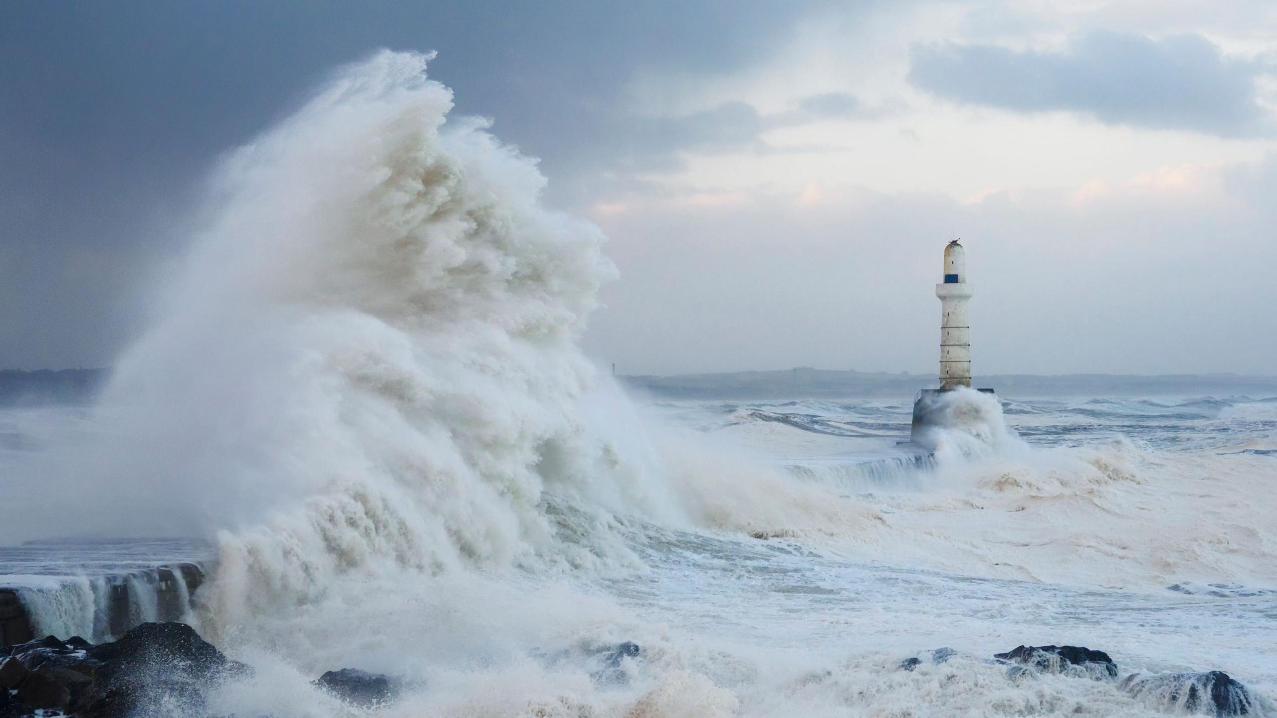 waves crashing into Aberdeen harbour