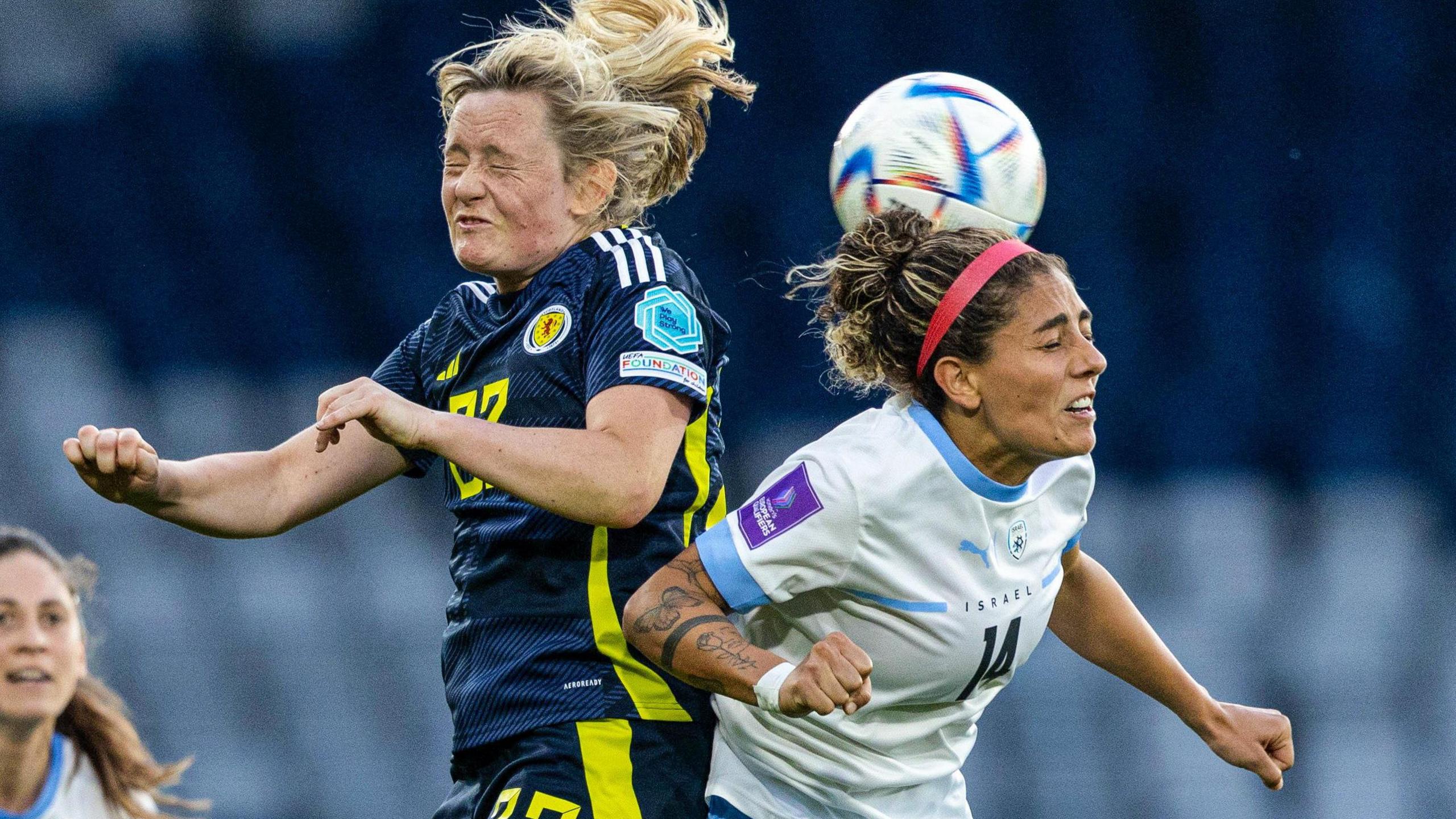 Erin Cuthbert contesting for a ball
