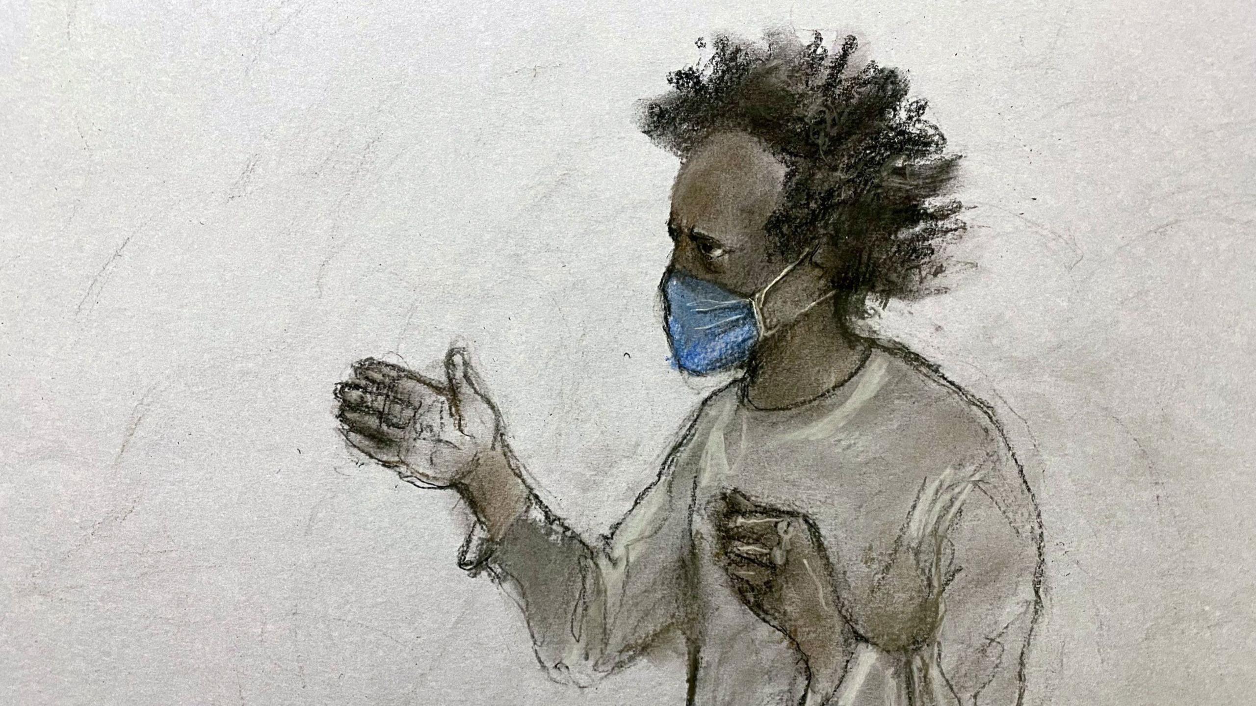 A court artist sketch depicts Southport stabbings suspect Axel Rudakubana, who has dark hair and is wearing a blue mask over his nose and mouth and in a grey jumper, gesturing from the court dock.
