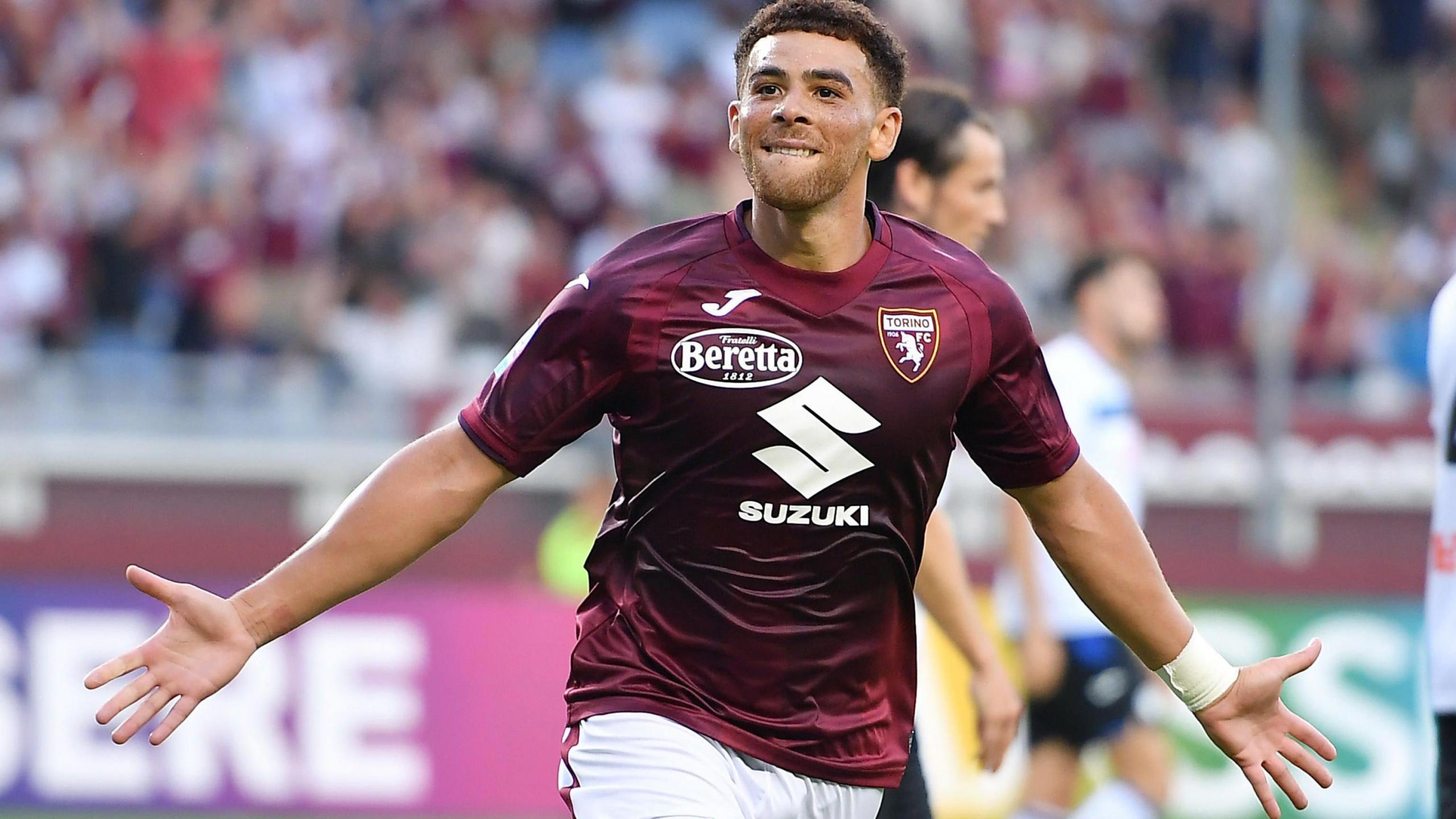 Che Adams celebrates scoring his first Serie A goal for Torino