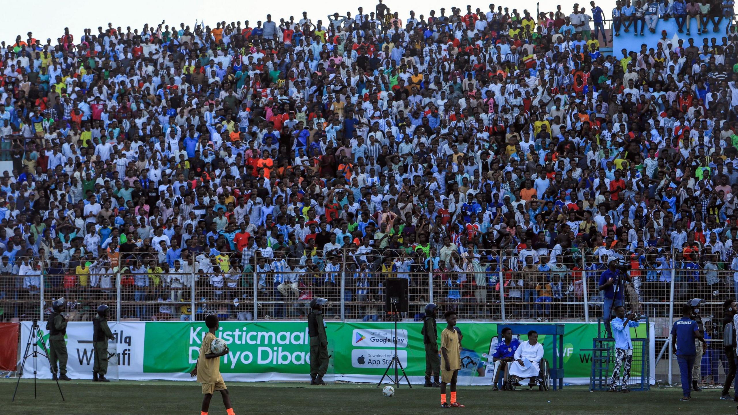 Thousands of fans pack the stands at the Mogadishu National Stadium