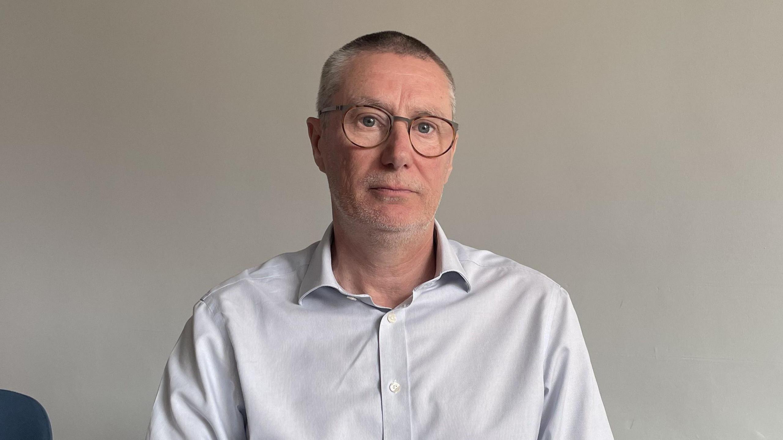 Anthony May, chief executive of Nottingham University Hospitals NUH NHS Trust, wearing a white shirt