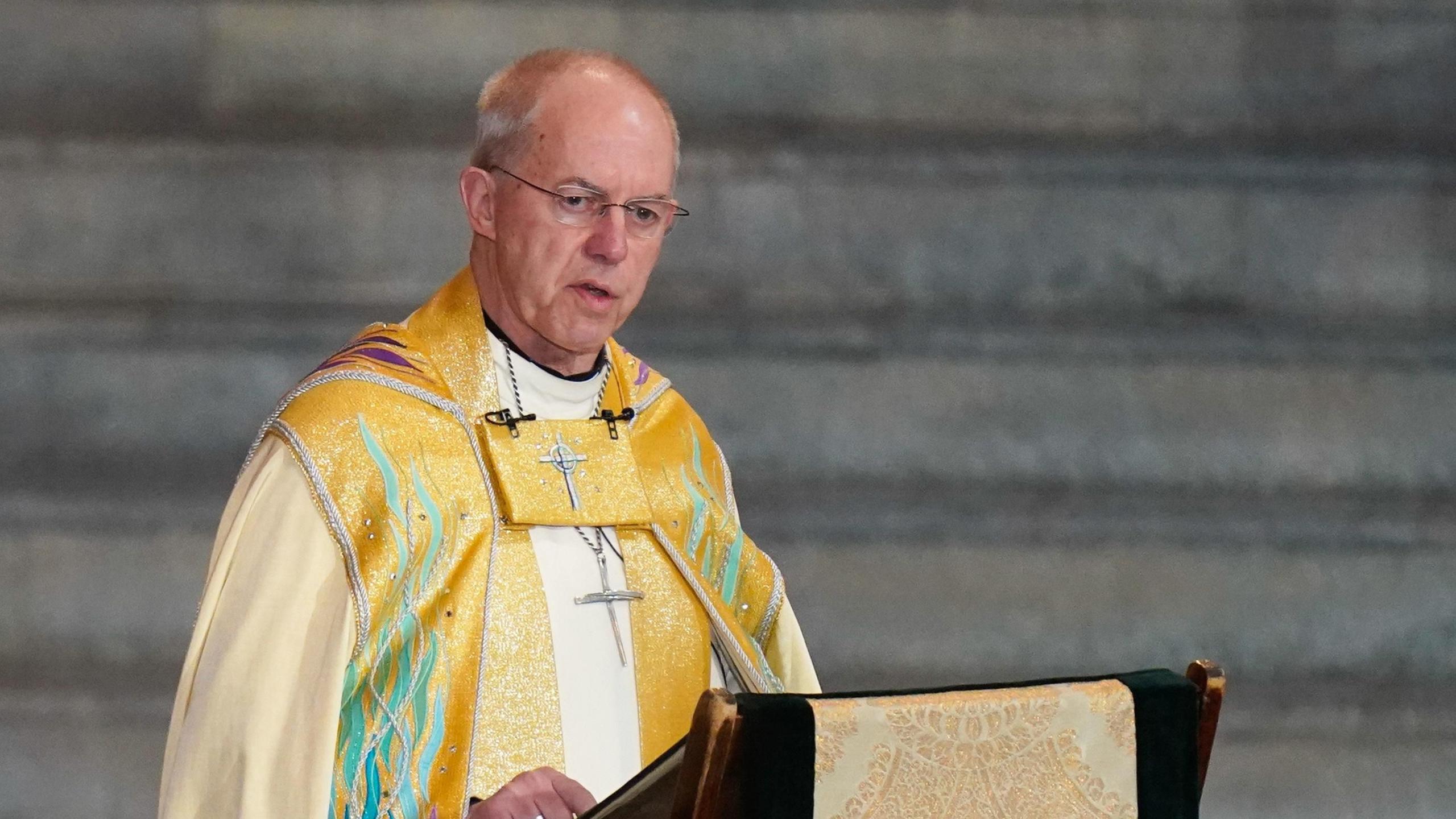 Justin Welby wearing ceremonial robes gives a sermon