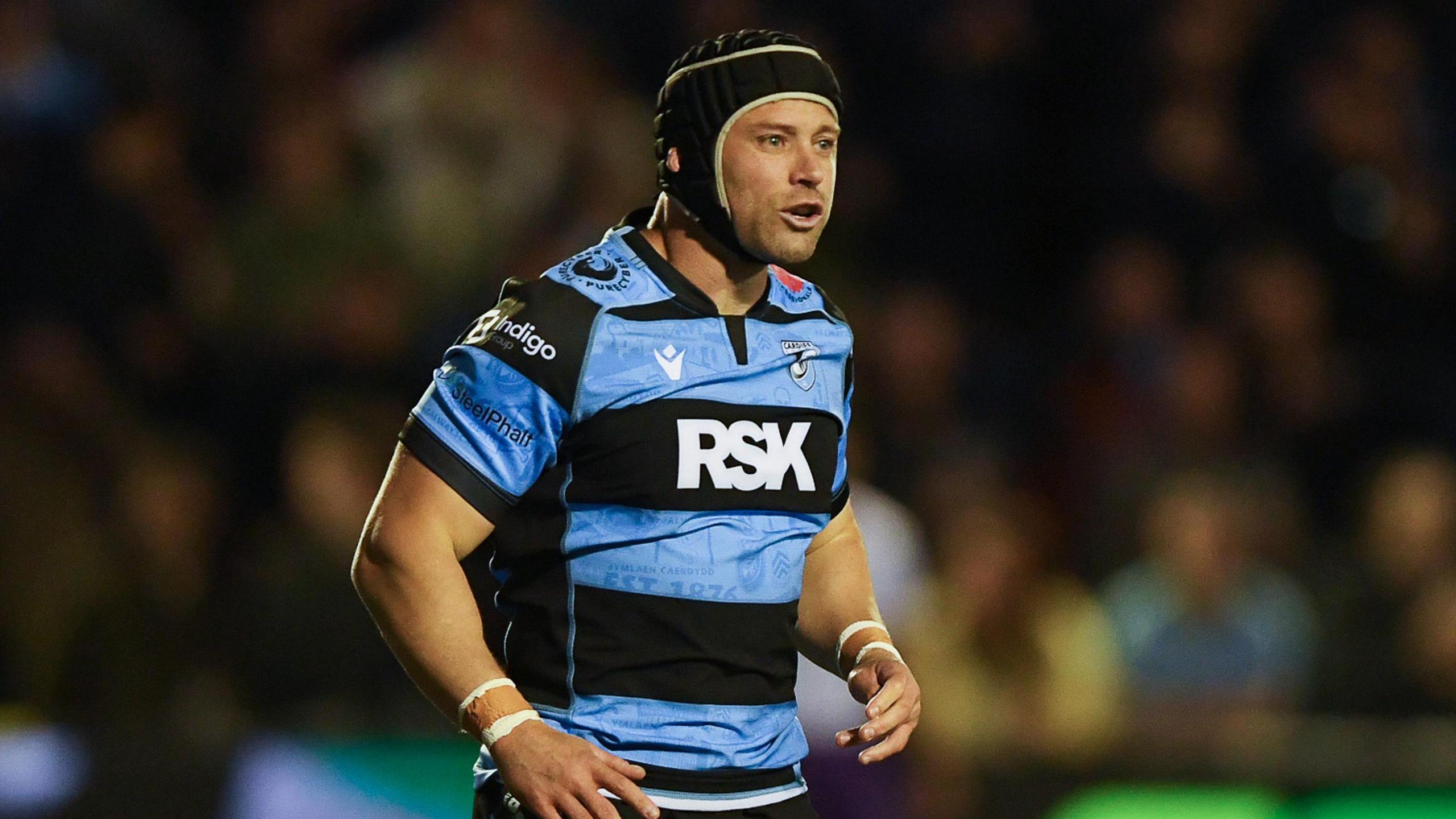 Leigh Halfpenny in the blue and black of Cardiff and his protective headgear.