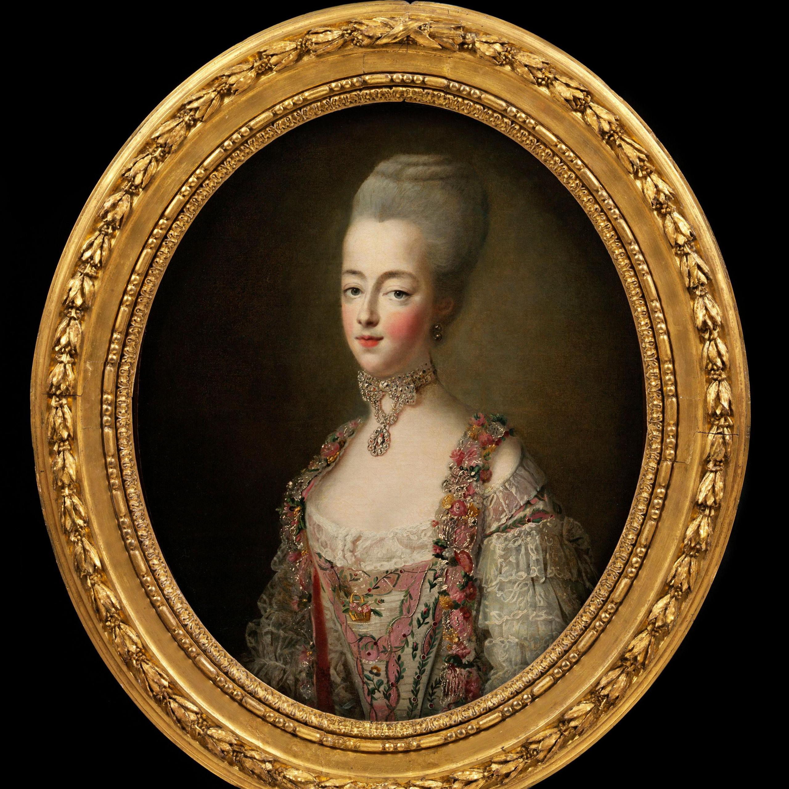 An oval-framed painted portrait of Marie Antoinette wearing a pink and white floral gown with lace and jewel embellishments, and a high powdered hairstyle