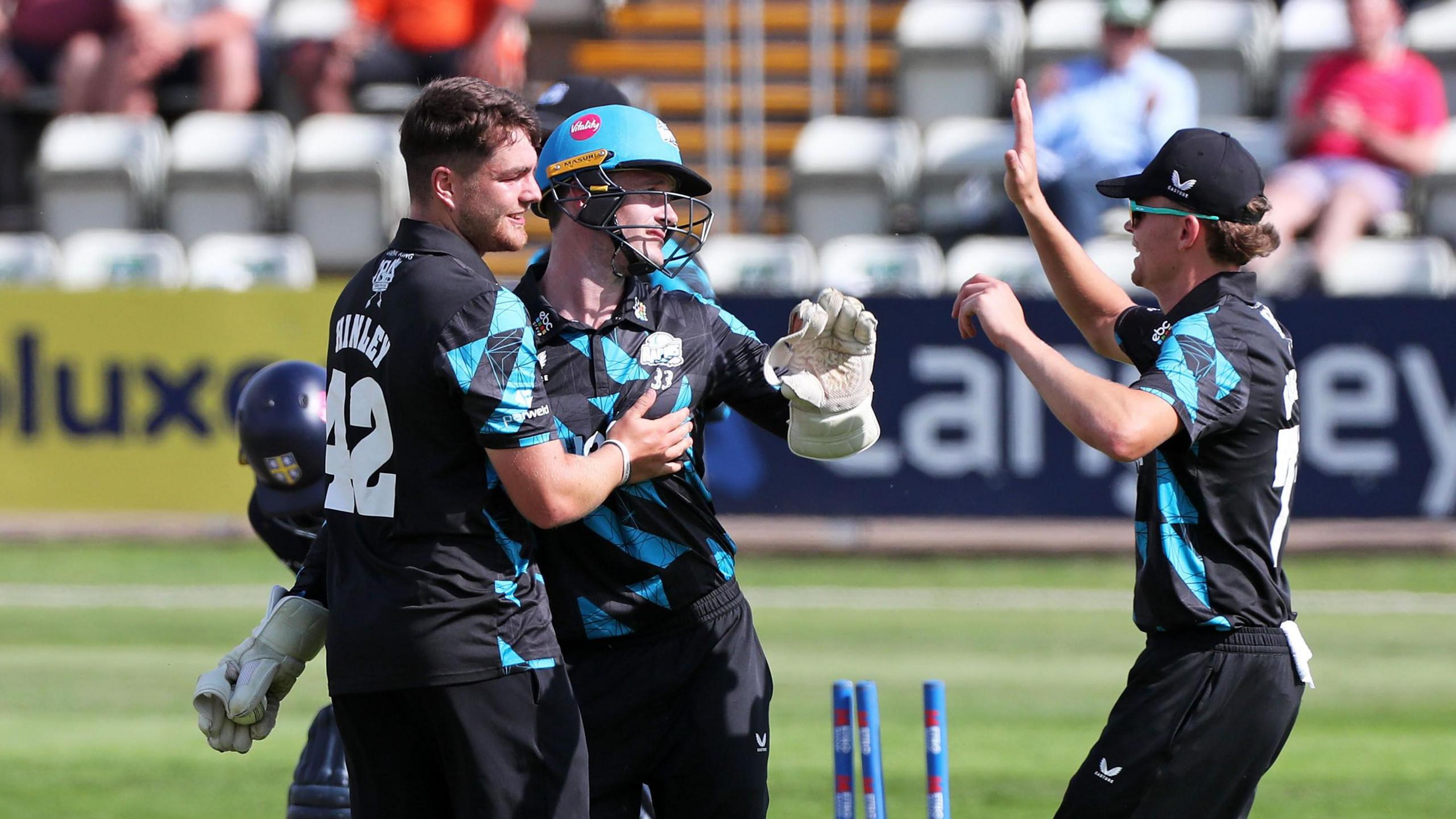 Tom Hinley celebrates one of his five Worcestershire wickets against Durham