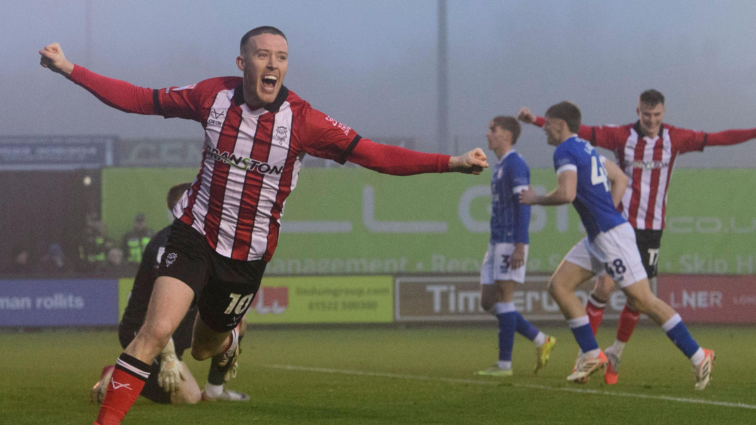 Jack Moylan celebrates Lincoln's opening goal