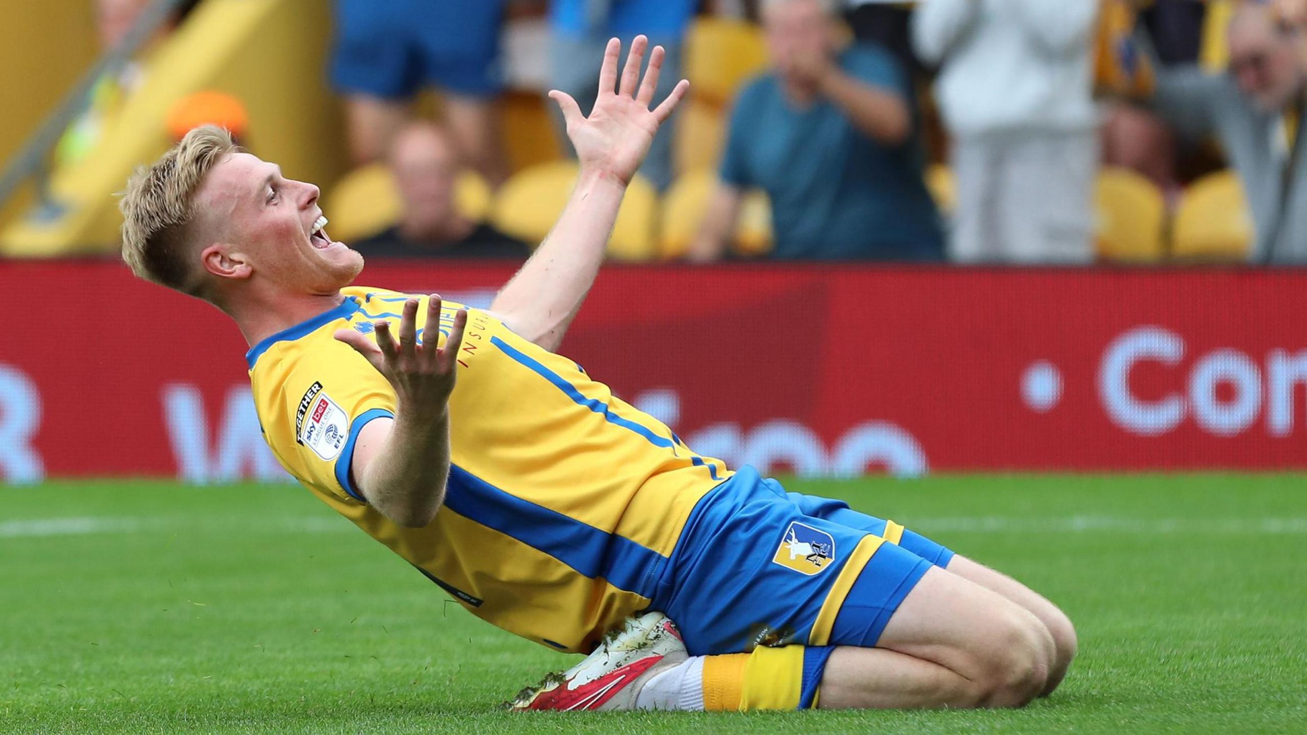 Mansfield's Will Evans celebrates his goal against Leyton Orient