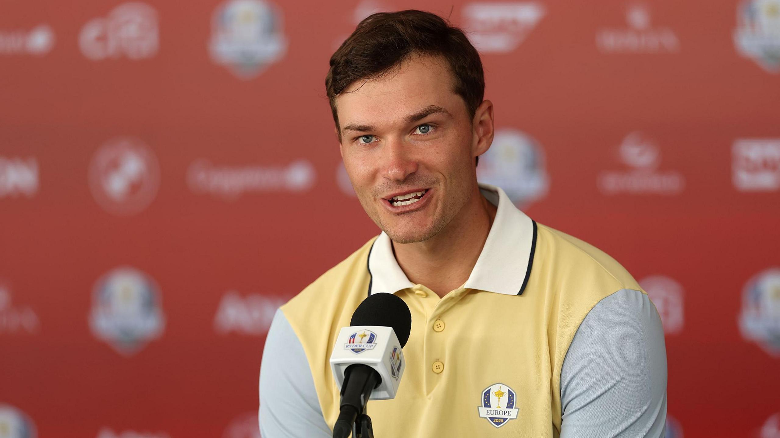 Rasmus Hojgaard talks to the media at Bethpage