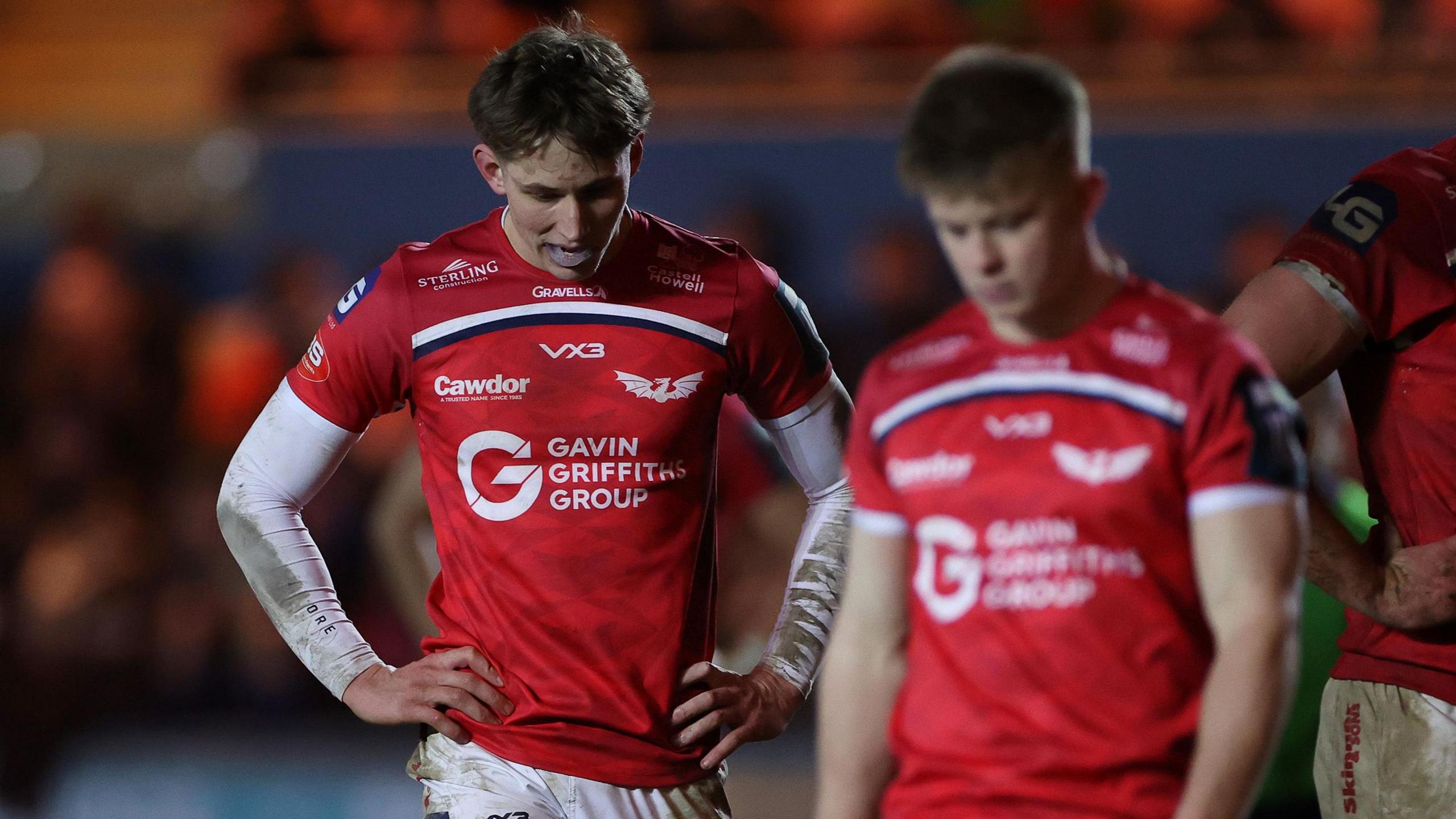 Scarlets wing Ellis Mee is dejected during the defeat to Ospreys