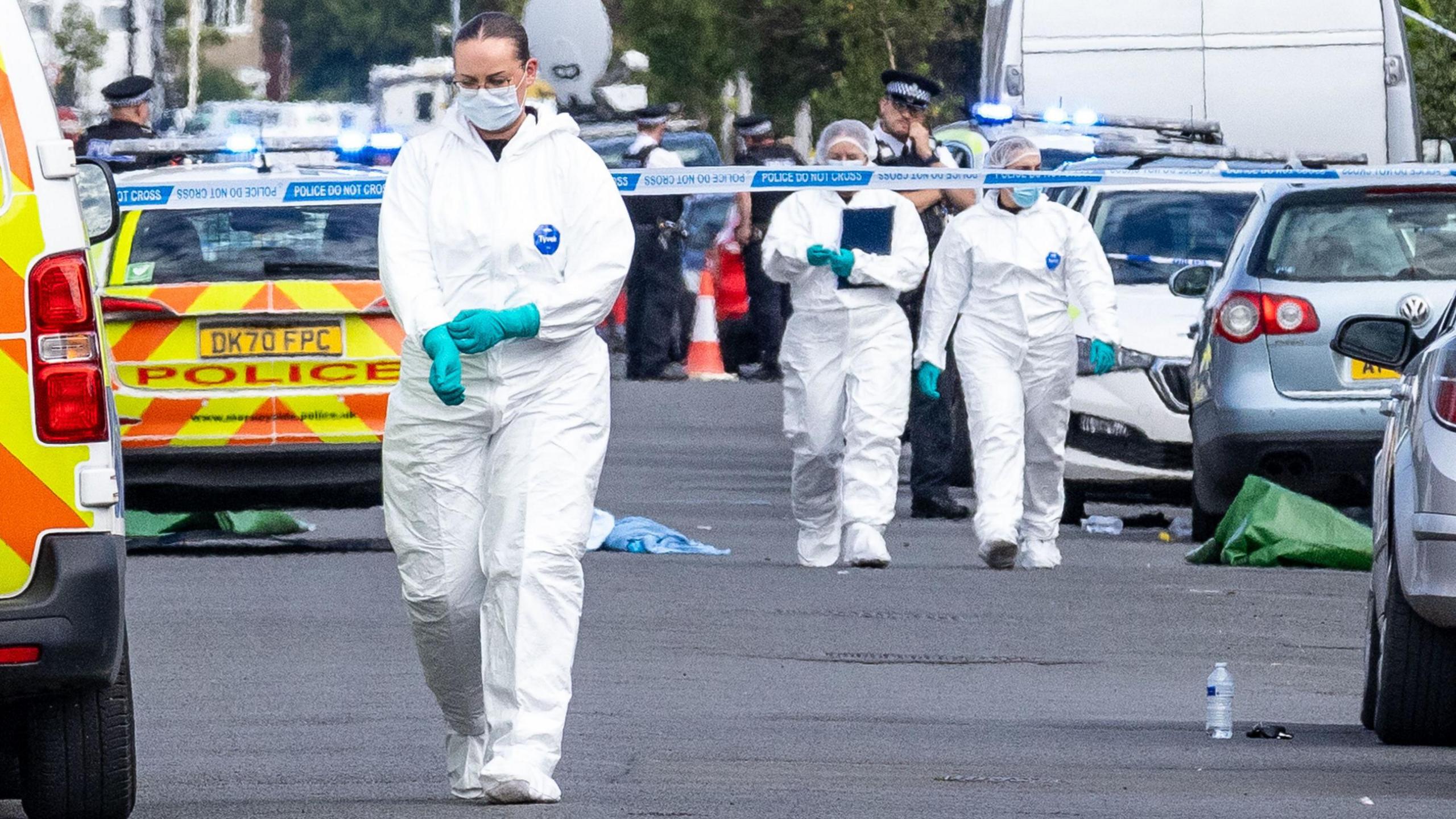Police scenes-of-crime officers at the scene in Southport where three girls were fatally stabbed at a dance class.