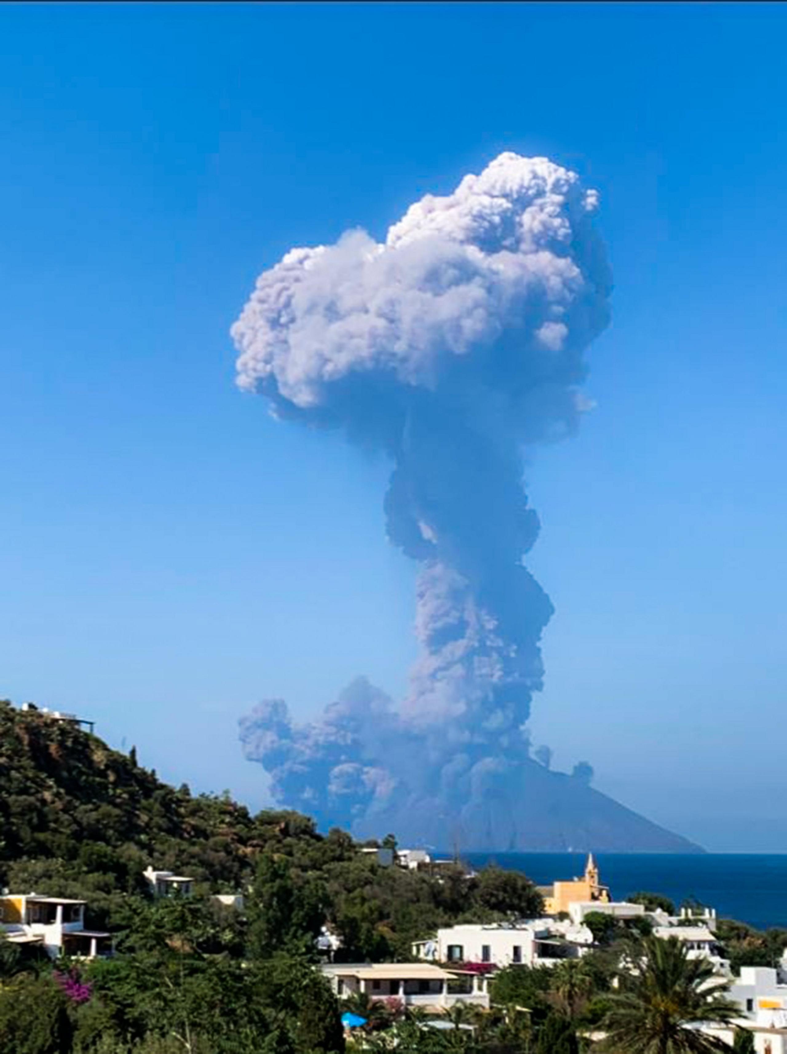 Ash rising from the volcano with the island of Panarea in the front